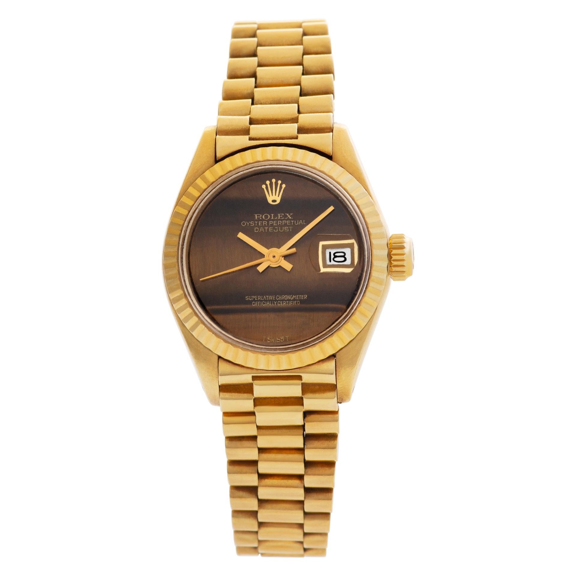 YOUR PRICE: $11,700.00

Rolex Datejust with original Tiger eye dial in 18k yellow gold. Auto w/ sweep seconds and date. 26 mm case size. Ref 6917. Circa 1973. 

Certified preowned Vintage Rolex Datejust reference 6917 watch is made out of  18k