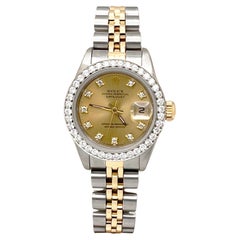 Rolex Montre Datejust pour femmes 69173 avec lunette en diamant et cadran en or jaune 18 carats et acier