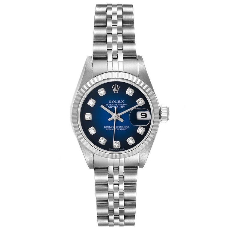 Rolex Datejust Ladies Steel 18k White Gold Blue Vignette Dial Watch 79174. Officially certified chronometer self-winding movement. Stainless steel oyster case 26.0 mm in diameter. Rolex logo on a crown. 18k white gold fluted bezel. Scratch resistant