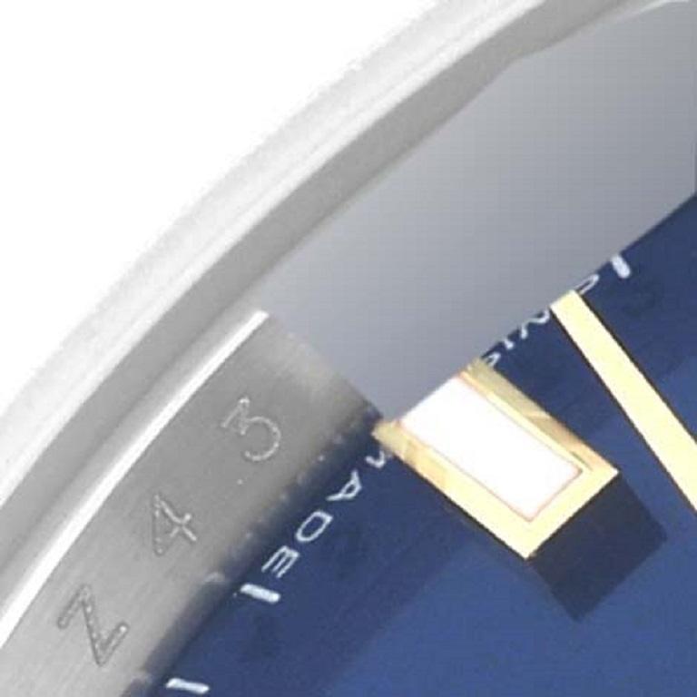 Rolex Datejust Ladies Steel Yellow Gold Blue Dial Watch 179163. Mouvement automatique à remontage automatique, officiellement certifié chronomètre, avec fonction de date rapide. Boîtier oyster en acier inoxydable de 26.0 mm de diamètre. Logo Rolex