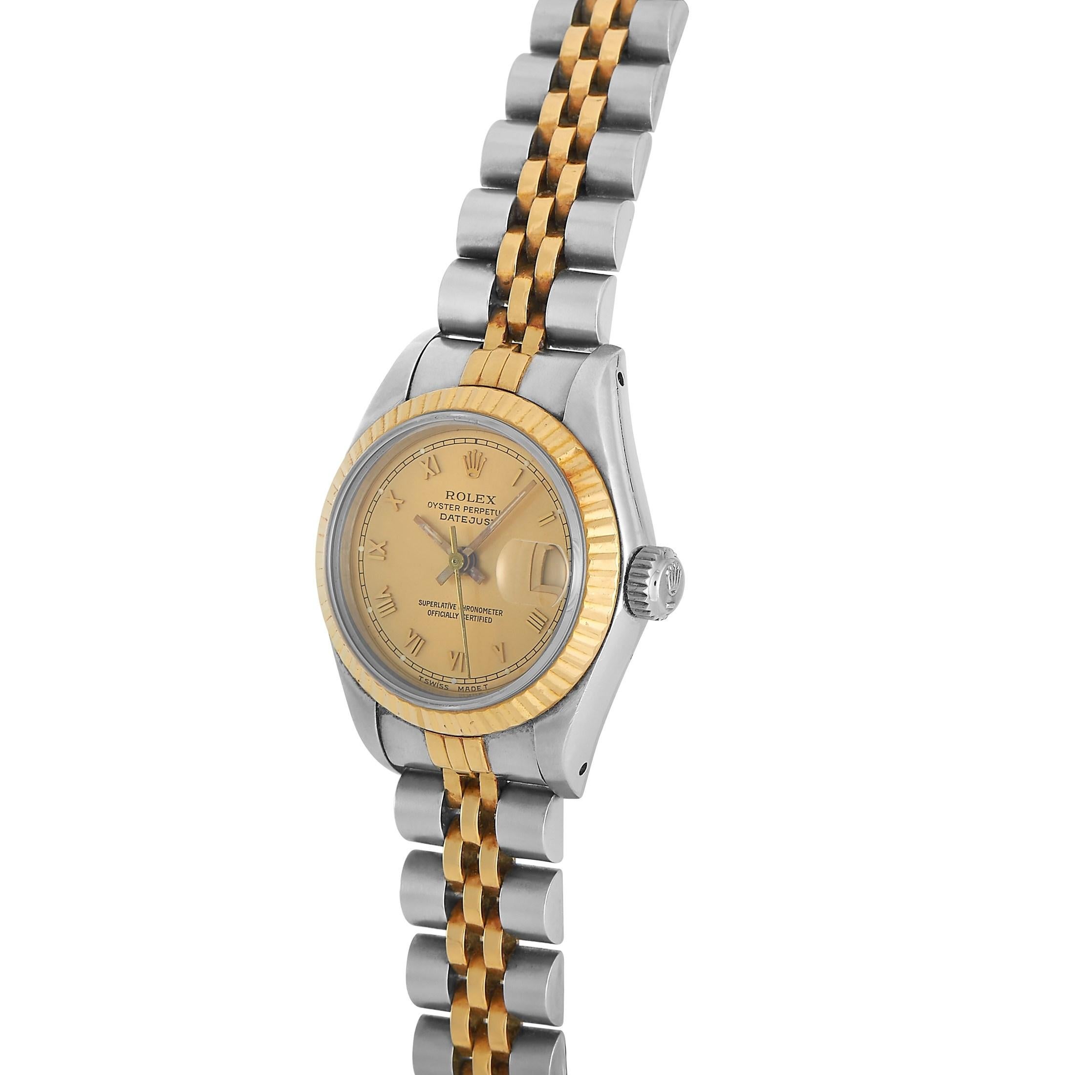 The Rolex Datejust Ladies Watch, reference number 691733B, is an everyday piece that allows you to add luxury to any outfit.

Perfectly poised, this timepiece includes a 26mm stainless steel case and an 18K Yellow Gold bezel. This chic pairing of