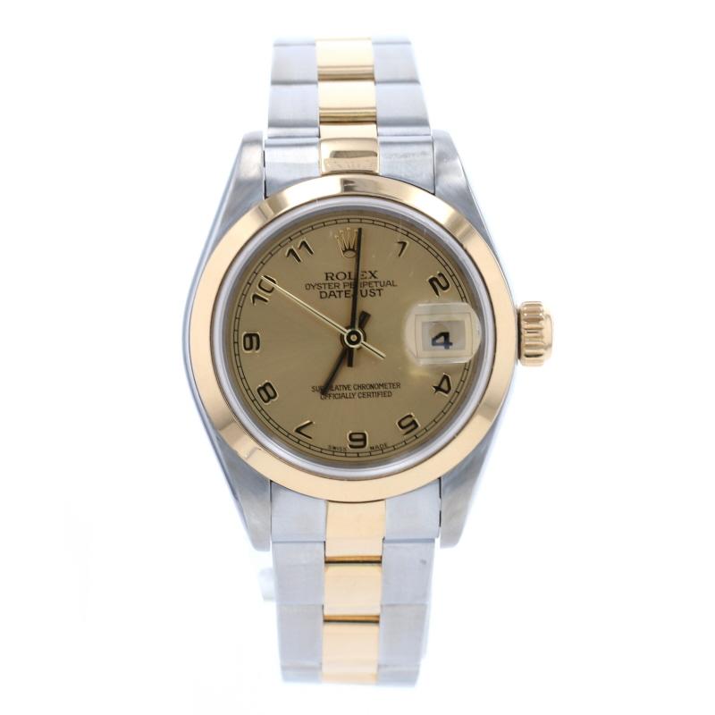 This is an authentic Rolex wristwatch. The watch comes with a one-year warranty along with the Rolex boxes and cleaning cloth.

Brand: Rolex Oyster Perpetual Datejust 
Model Number: 69163 
Year: 1998 
Metal Content: Stainless Steel & 18k Yellow