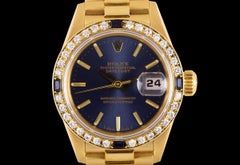 Rolex Datejust Ladies Yellow Gold Blue Dial Diamond and Sapphire Bezel 69088