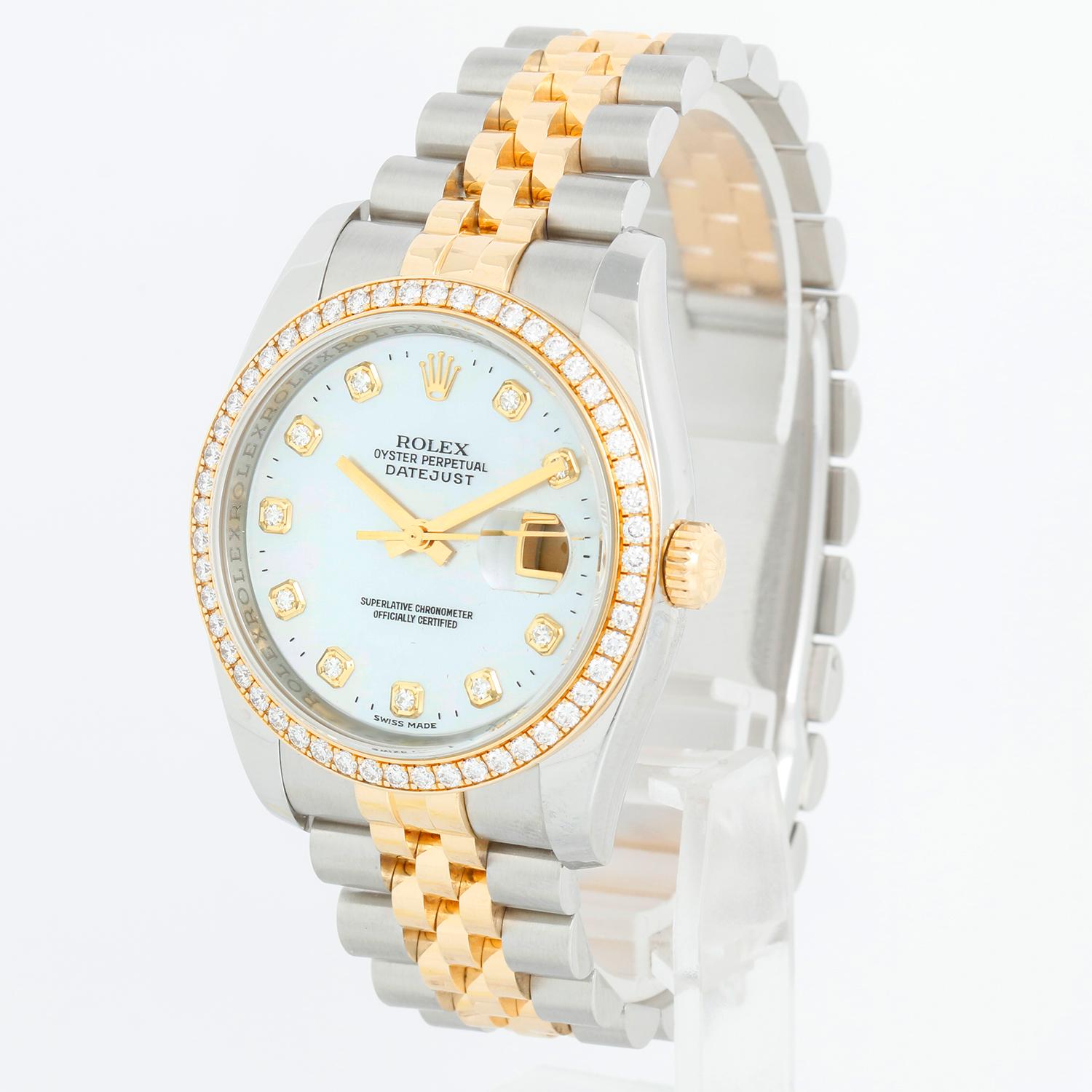 Rolex Datejust Men's 2-Tone Steel & Gold Watch 116243 - Automatic winding, 31 jewels, Quickset, sapphire crystal. Stainless steel case with factory Rolex 52 diamond bezel (36mm diameter). Mother of Pearl diamond dial. Stainless steel and 18k yellow