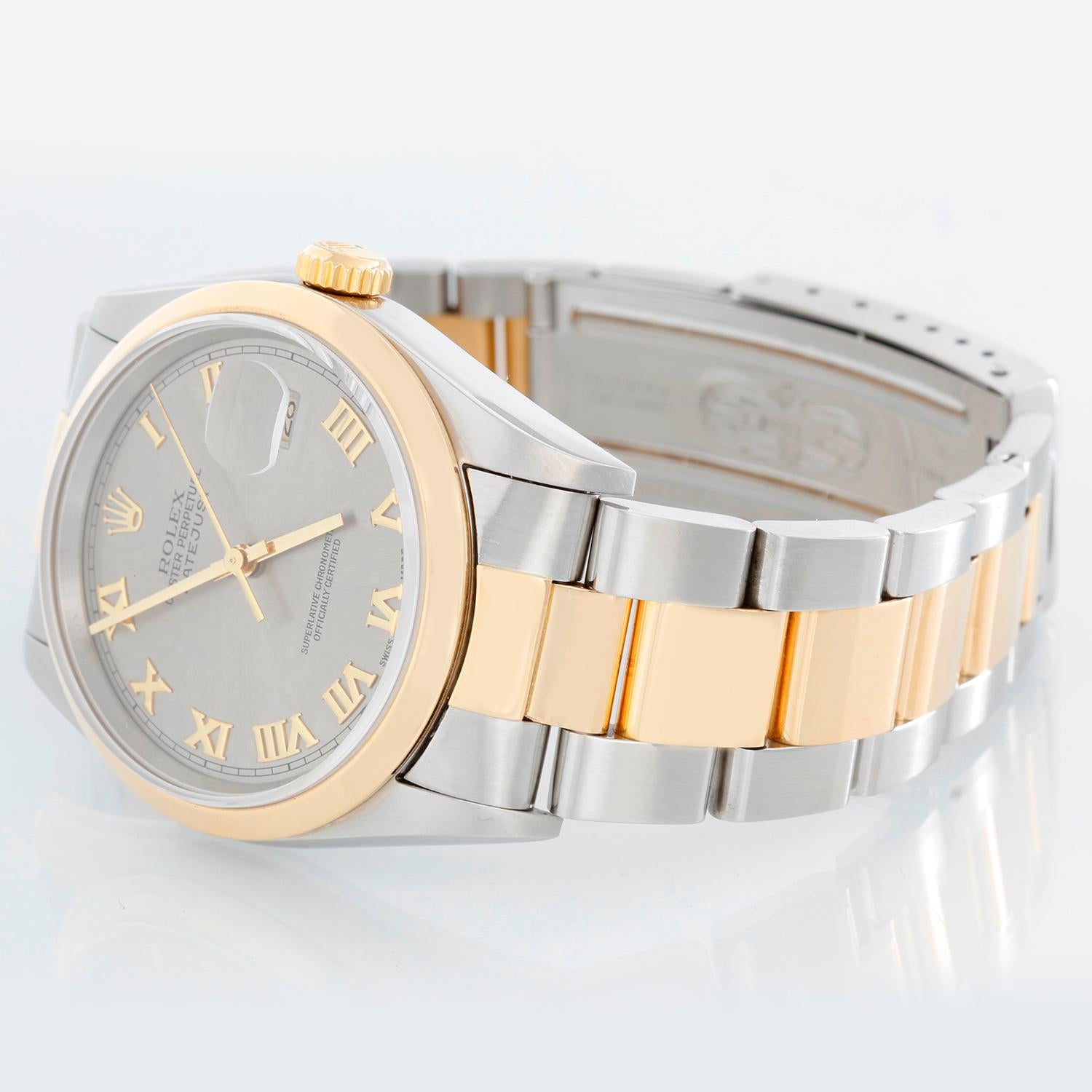 Rolex Datejust Men's 2-Tone Steel & Gold Watch 16203 - Automatic winding, 31 jewels, Quickset, sapphire crystal. Stainless steel with 18k yellow gold smooth bezel (36mm diameter). Rhodium dial with roman numerals . Rolex Two- tone Oyster bracelet.