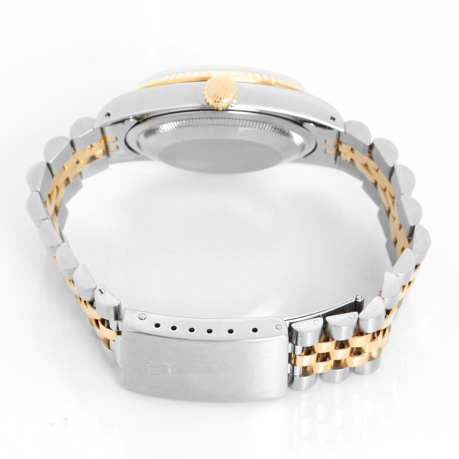 Rolex Datejust Men's 2-Tone Tiffany Dial Watch 16233 - Automatic winding, 31 jewels, Quickset, sapphire crystal. Stainless steel with 18k yellow gold fluted bezel (36mm diameter). Rare Silver Tiffany Dial. Rolex two-tone Jubilee bracelet. Pre-owned