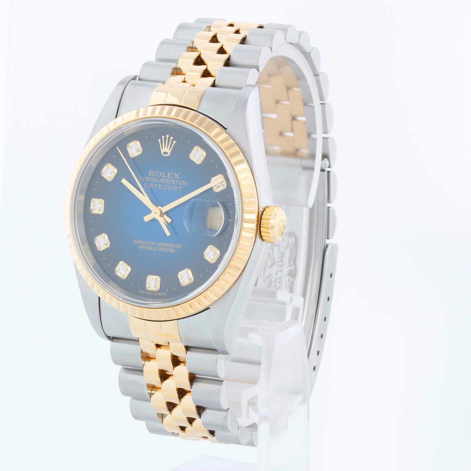 Rolex Datejust Men's 2-Tone Watch  Blue Vignette Dial 16233 - Automatic winding, 31 jewels, Quickset, sapphire crystal. Stainless steel with 18k yellow gold fluted bezel (36mm diameter). Factory blue vignette dial. Stainless steel and 18k yellow