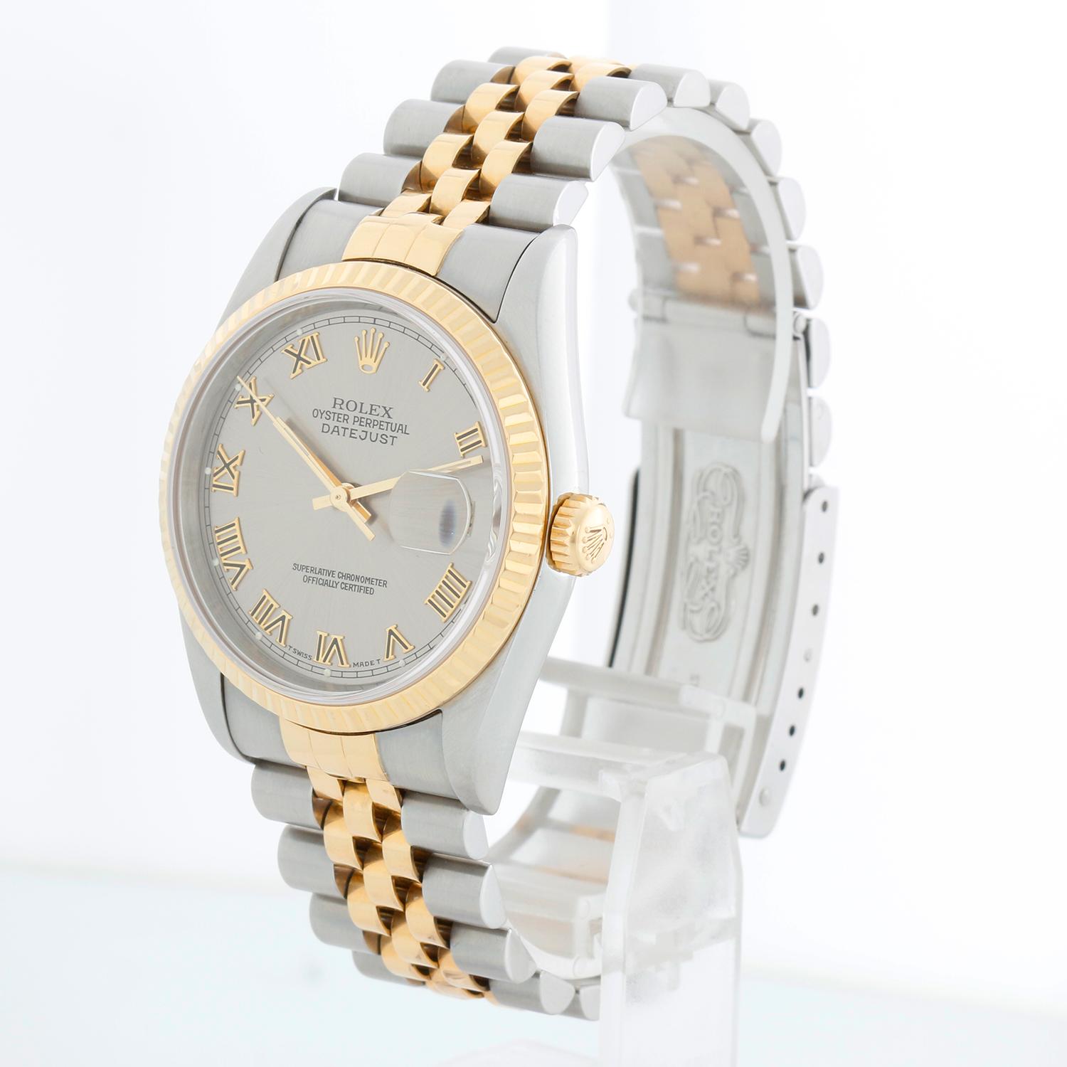 Rolex Datejust 2-Tone Herrenuhr Silbernes Zifferblatt 16233 - Automatischer Aufzug, 31 Juwelen, Quickset, Saphirglas. Datejust. Edelstahl mit geriffelter Lünette aus 18 Karat Gelbgold. Rhodium-Zifferblatt mit erhabenen römischen Ziffern aus