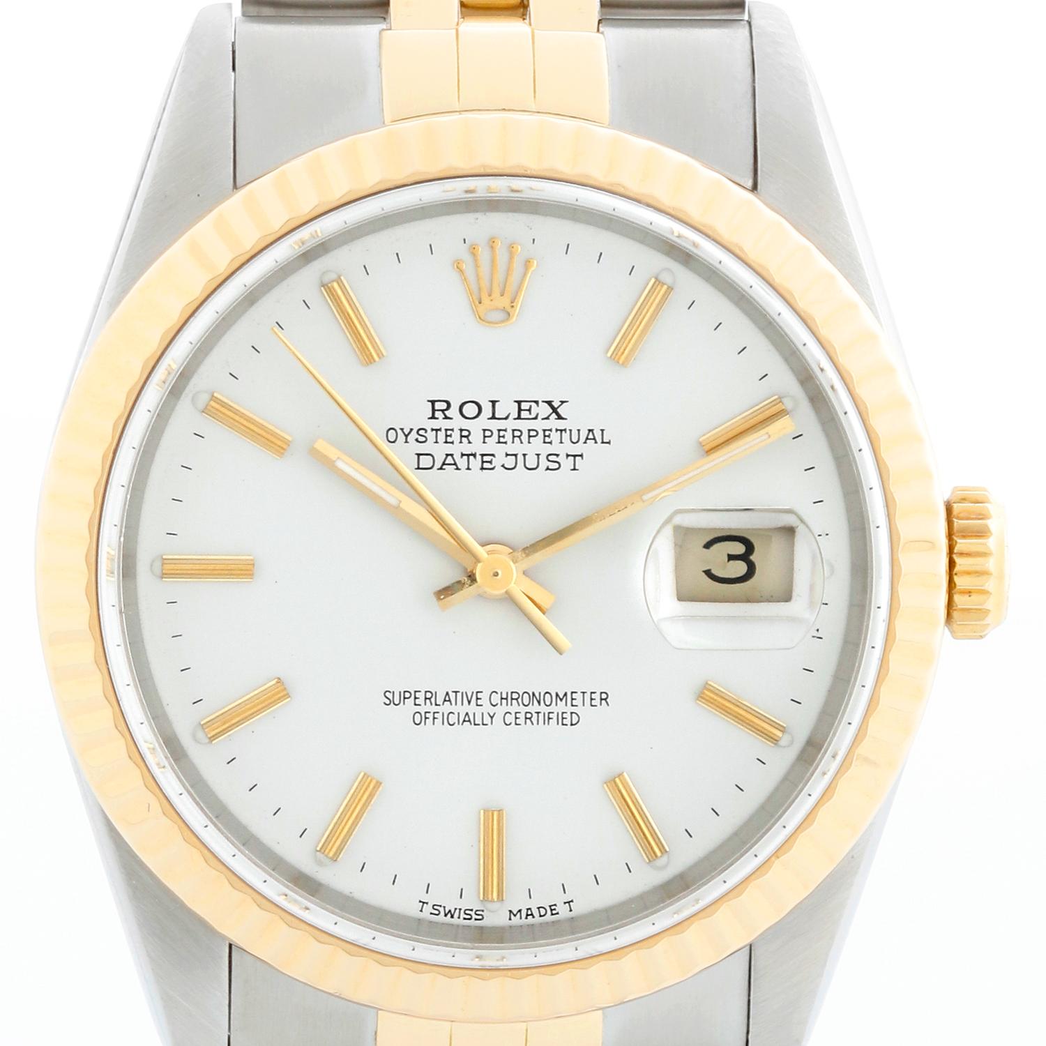 Rolex Datejust Men's 2-Tone  White Dial Watch 16233 - Automatic winding, 31 jewels, Quickset, sapphire crystal. Stainless steel with 18k yellow gold fluted bezel . White Stick Dial. Stainless steel and 18K Yellow gold jubilee bracelet. Pre-owned