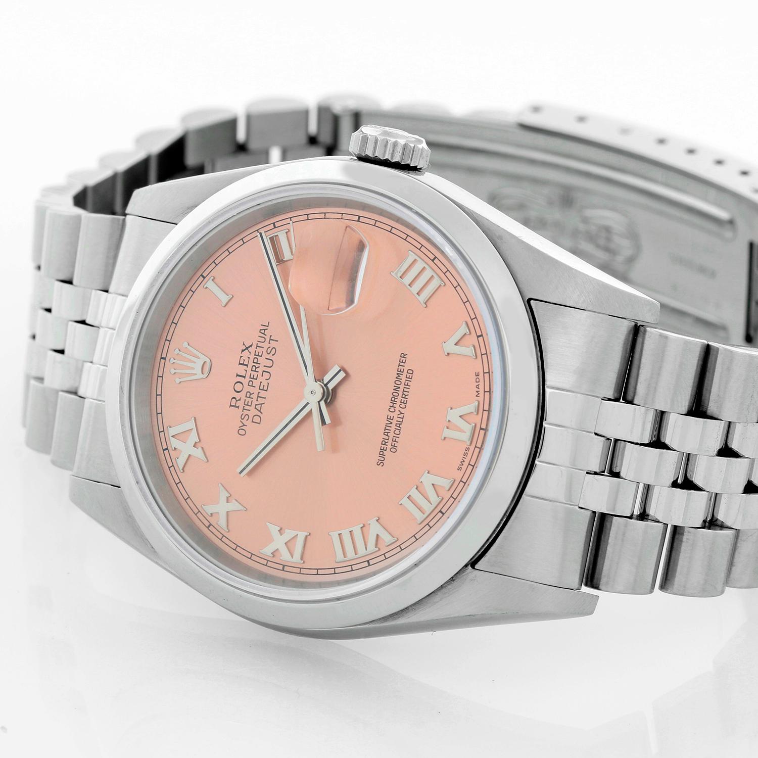 Rolex Datejust Men's Stainless Steel Automatic 16200 - Automatic winding. Stainless steel case with smooth bezel (36mm diameter). Salmon dial with Roman numerals; date at 3 o'clock. Stainless steel Jubilee bracelet. Pre-owned with custom box. 