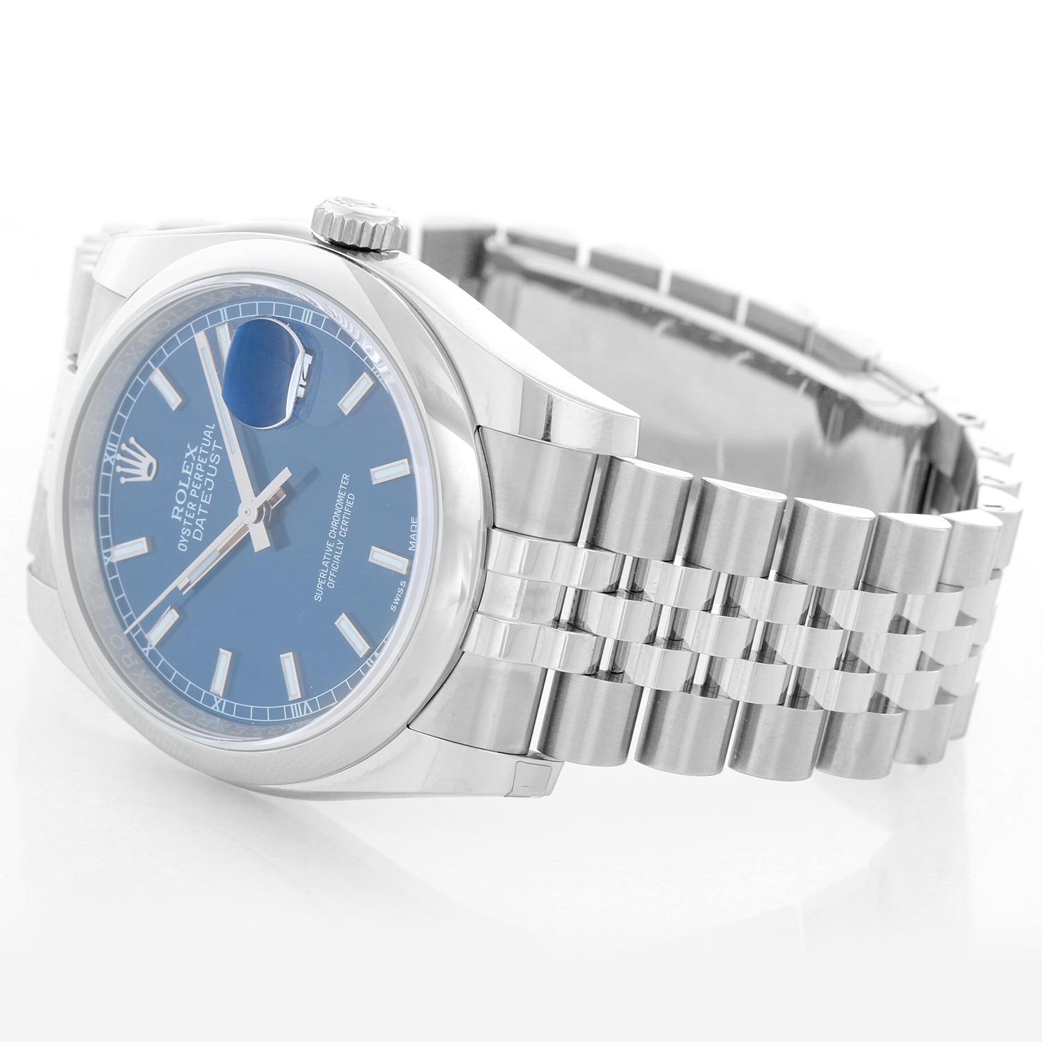 Rolex Datejust Men's Stainless Steel Automatic Winding Watch 116200 - Automatic winding, 31 jewels, Quickset, sapphire crystal. Stainless steel case with smooth bezel (36mm diameter). Blue dial with luminous style markers. Stainless steel Jubilee