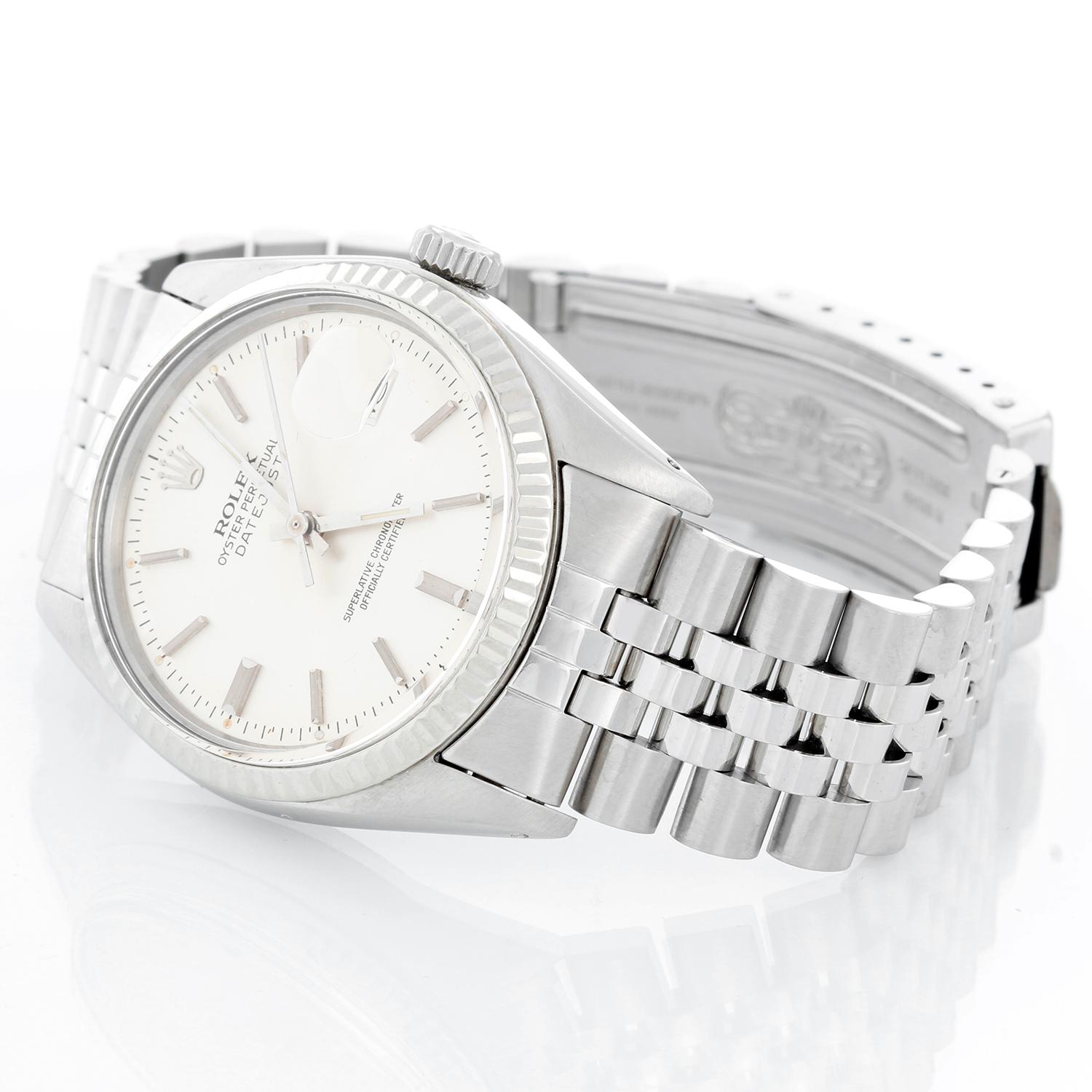 Rolex Datejust Men's Stainless Steel Watch 16014 - Automatic winding, 27 jewels, Quickset, acrylic crystal. Stainless steel with white gold fluted bezel . (36 mm ) Silver dial with stick hour markers. Stainless steel Jubilee bracelet. Pre-owned with