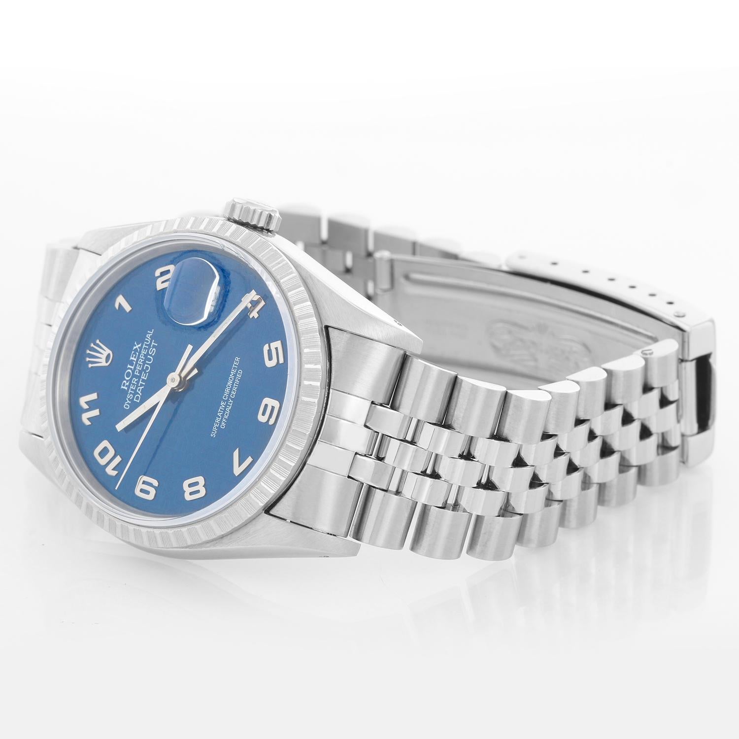 Rolex Datejust Men's Stainless Steel Watch 16220 - Automatic winding, 31 jewels, Quickset, sapphire crystal. Stainless steel case with engine turned bezel (36mm diameter). Blue Jubilee dial with Arabic markers. Stainless steel Oyster bracelet.