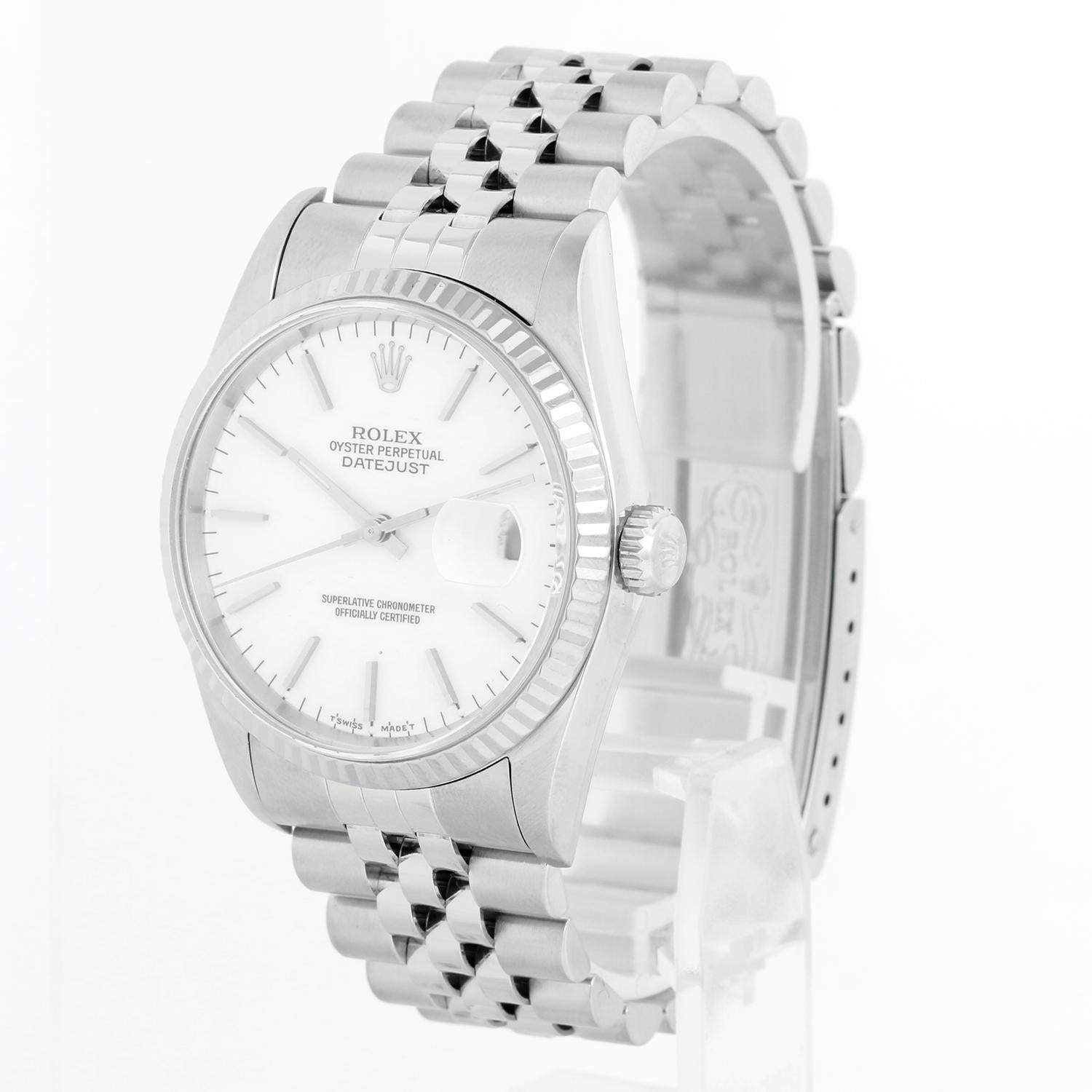 Rolex Datejust Men's Stainless Steel Watch 16234 - Automatic winding, 31 jewels, Quickset, sapphire crystal. Stainless steel case with 18k white gold fluted bezel  (36mm diameter). White dial with stick markers. Stainless steel Jubilee bracelet.