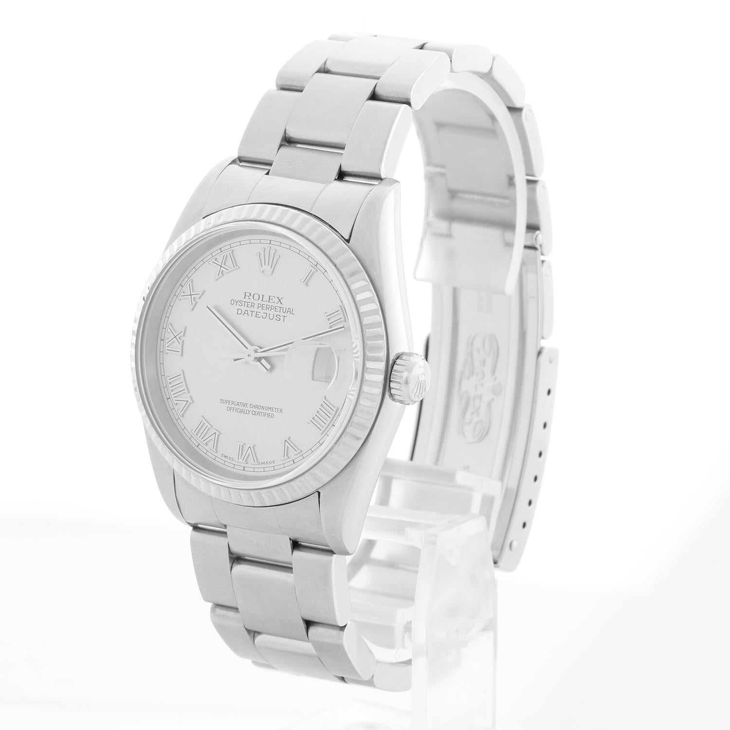 Rolex Datejust Herren-Edelstahluhr 16234 - Automatischer Aufzug, 31 Juwelen, Quickset, Saphirglas. Datejust. Edelstahlgehäuse mit geriffelter Lünette  (36 mm Durchmesser). Silbernes Zifferblatt mit erhabenen römischen Ziffern. Oyster-Armband aus