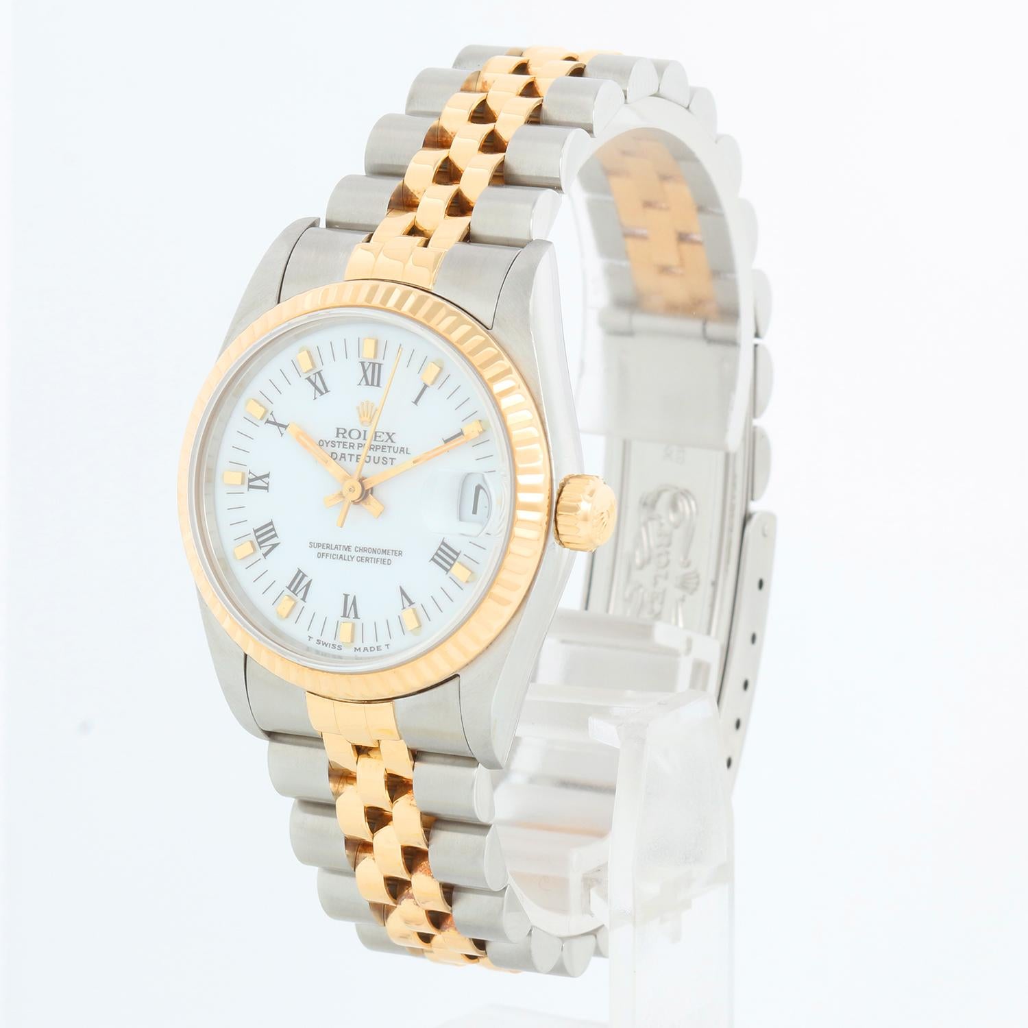 Rolex Datejust Midsize 2-Tone Watch 68273 - Automatic winding, 29 jewels, Quickset, sapphire crystal.  Stainless steel case with 18k yellow gold  fluted bezel. White dial with roman numerals. Stainless steel and 18k yellow gold Jubilee bracelet.