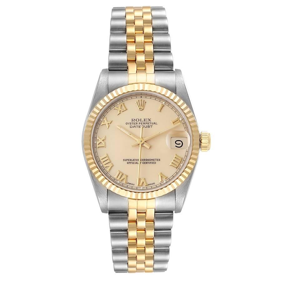 Rolex Datejust Midsize 31 Ivory Roman Dial Steel Yellow Gold Watch 68273. Officially certified chronometer self-winding movement. Stainless steel oyster case 31 mm in diameter. Rolex logo on a 18K yellow gold crown. 18k yellow gold fluted bezel.
