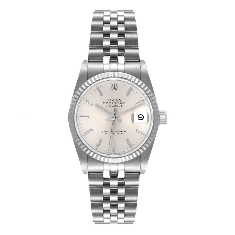Rolex Datejust Midsize 31 Silver Dial Ladies Watch 68274 Box Papers. Officially certified chronometer self-winding movement. Stainless steel oyster case 31.0 mm in diameter. Rolex logo on a crown. 18k white gold fluted bezel. Scratch resistant