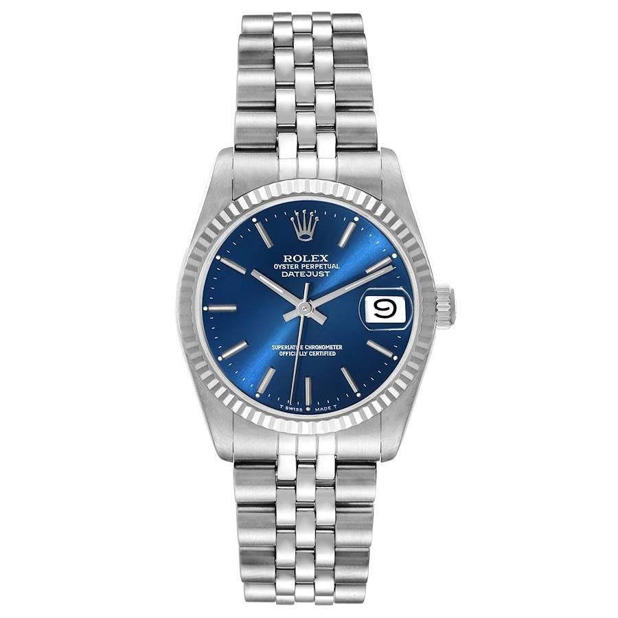 Rolex Datejust Midsize 31 Steel White Gold Blue Dial Ladies Watch 68274. Officially certified chronometer automatic self-winding movement. Stainless steel oyster case 31.0 mm in diameter. Rolex logo on the crown. 18k white gold fluted bezel. Scratch