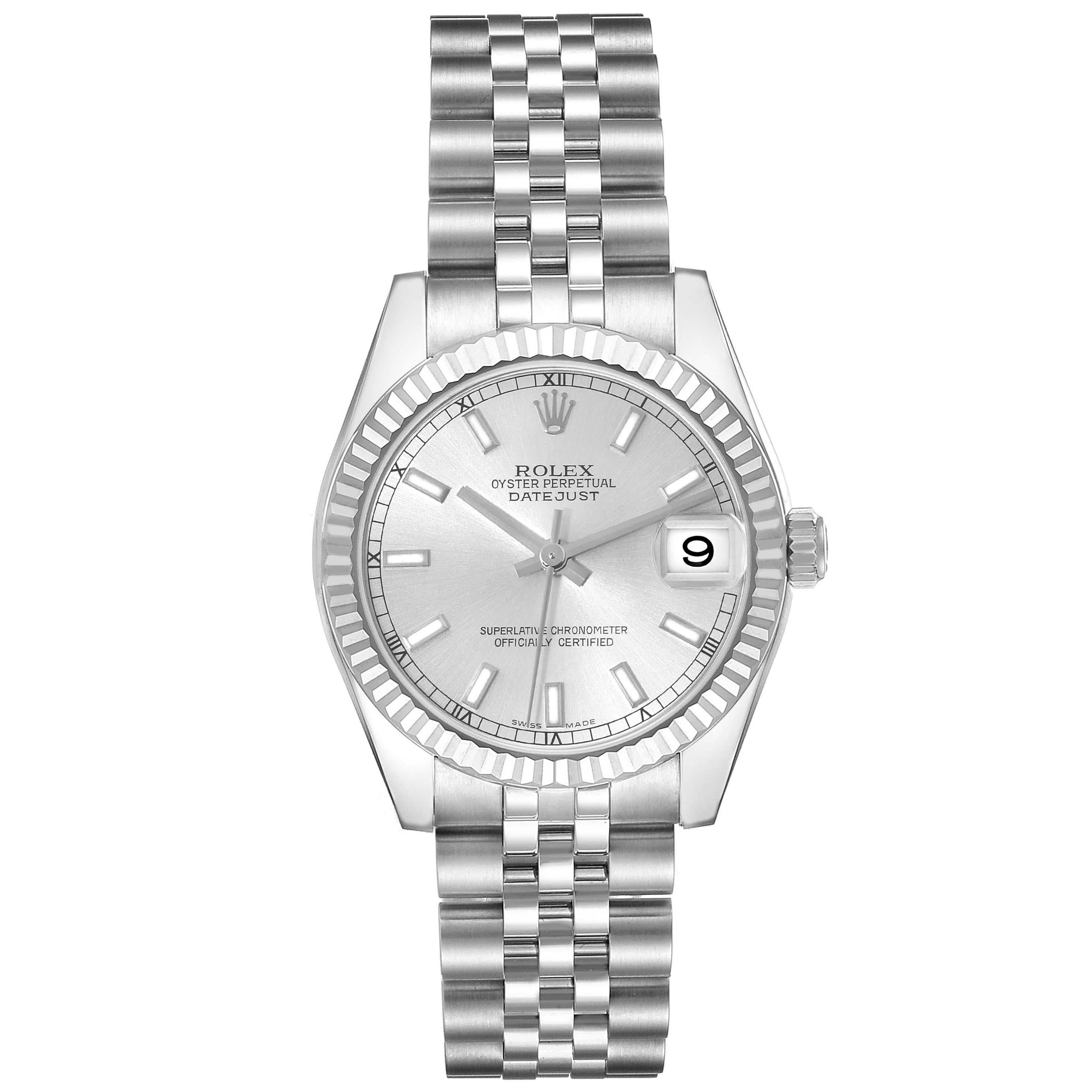 Rolex Datejust Midsize 31 Steel White Gold Silver Dial Ladies Watch 178274. Officially certified chronometer automatic self-winding movement. Stainless steel oyster case 31.0 mm in diameter. Rolex logo on the crown. 18k white gold fluted bezel.