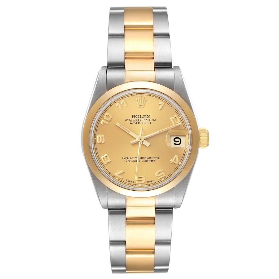 Rolex Datejust Midsize 31 Steel Yellow Gold Ladies Watch 68243. Mouvement à remontage automatique certifié officiellement chronomètre. Boîtier oyster en acier inoxydable de 31 mm de diamètre. Logo Rolex sur une couronne en or jaune 18 carats.