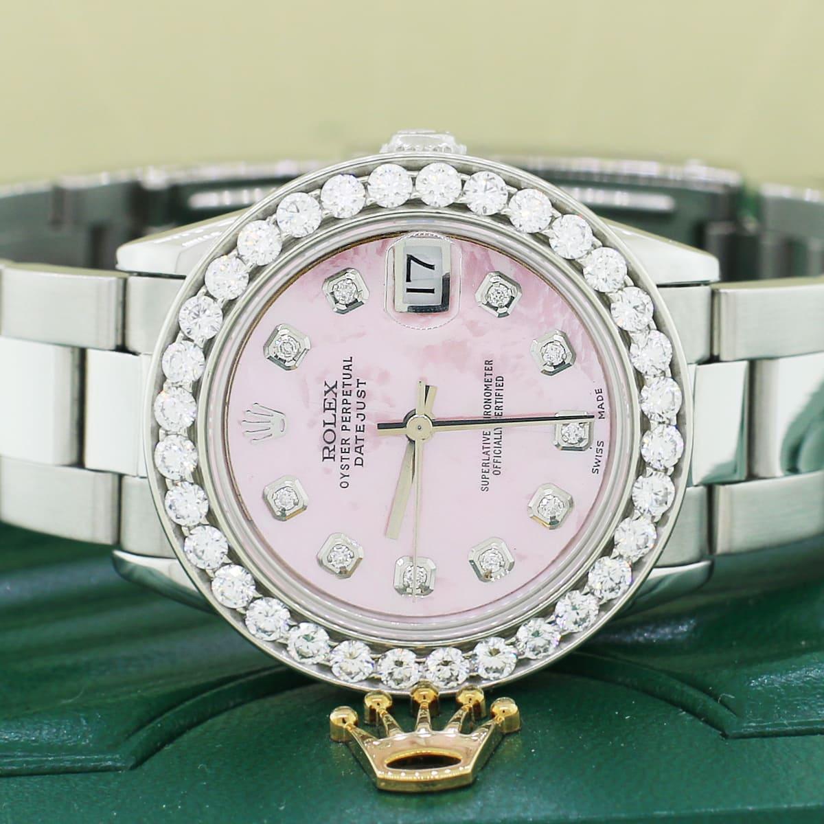 Rolex Datejust Midsize Stainless Steel Watch. Self-winding rolex automatic movement. Stainless steel 31mm case featuring custom 2.25Ct diamond bezel. Screw-down crown. Scratch-resistant sapphire crystal. Custom pink MOP dial with diamond hour
