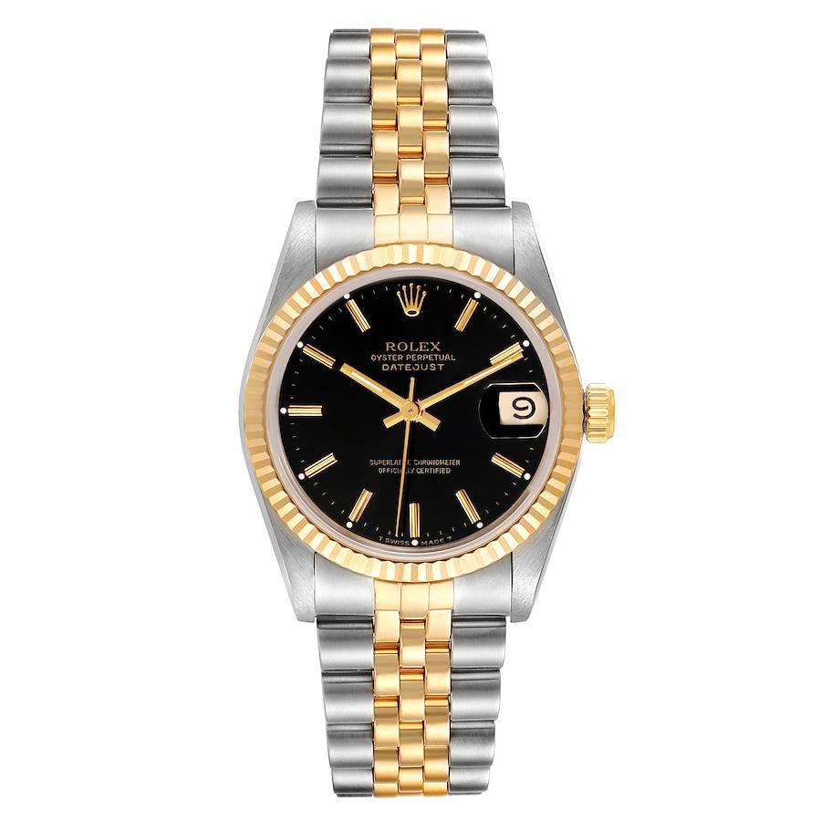 Rolex Datejust Midsize 31mm Steel Yellow Gold Black Dial Ladies Watch 68273. Officially certified chronometer self-winding movement. Stainless steel oyster case 31 mm in diameter. Rolex logo on a 18K yellow gold crown. 18k yellow gold fluted bezel.