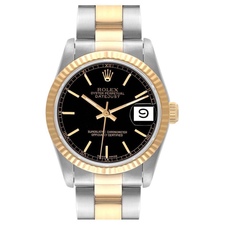 datejust gold black dial
