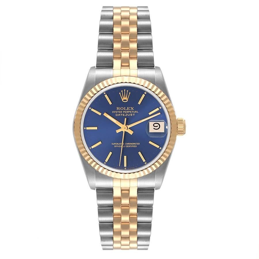 Rolex Datejust Midsize 31mm Stahl Gelb Gold Blau Zifferblatt Damenuhr 68273. Offiziell zertifiziertes Chronometerwerk mit automatischem Aufzug. Austerngehäuse aus Edelstahl mit einem Durchmesser von 31 mm. Rolex-Logo auf einer Krone aus 18 Karat