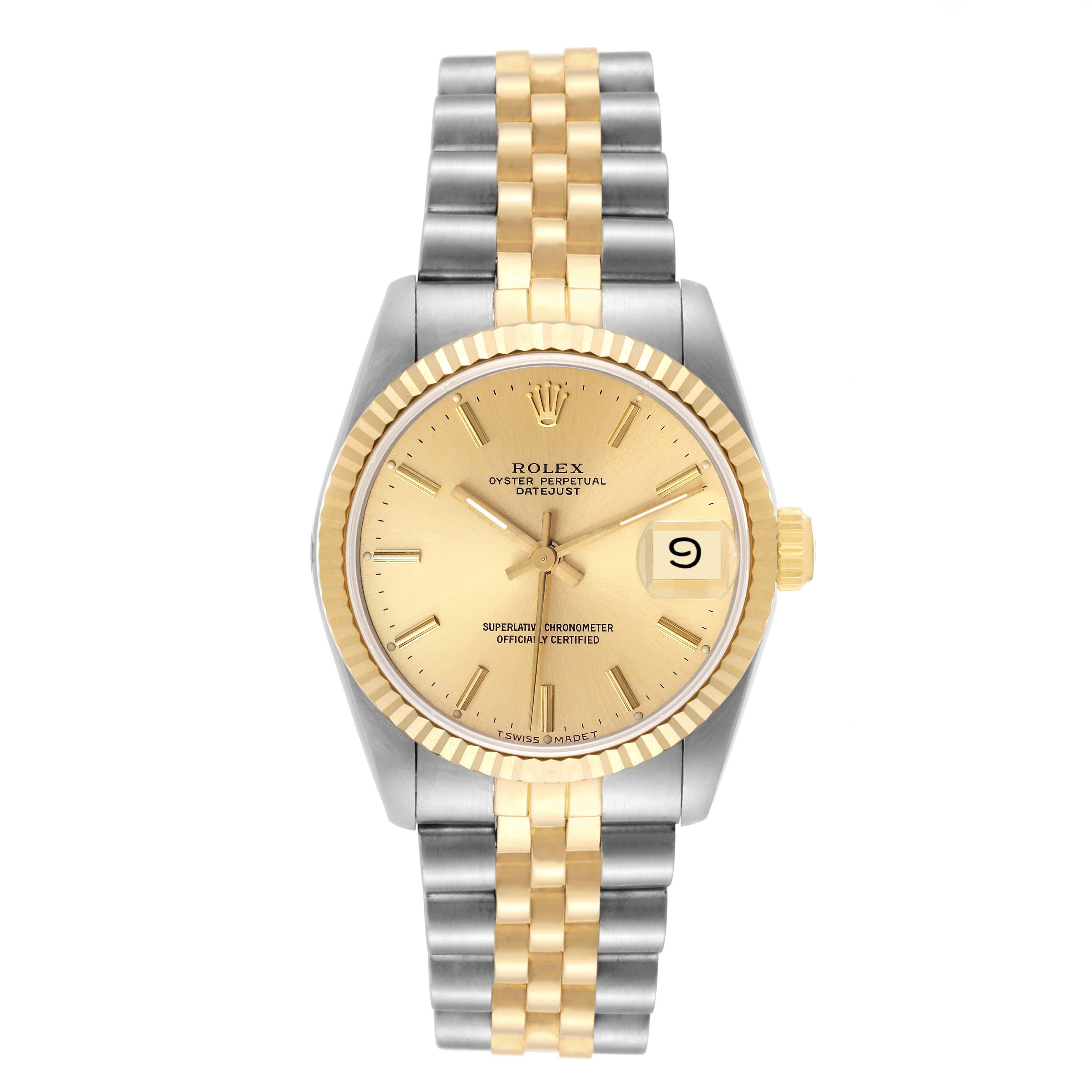 Rolex Datejust Midsize Champagne Dial Steel Yellow Gold Ladies Watch 68273. Officially certified chronometer automatic self-winding movement. Stainless steel oyster case 31 mm in diameter. Rolex logo on an 18K yellow gold crown. 18k yellow gold