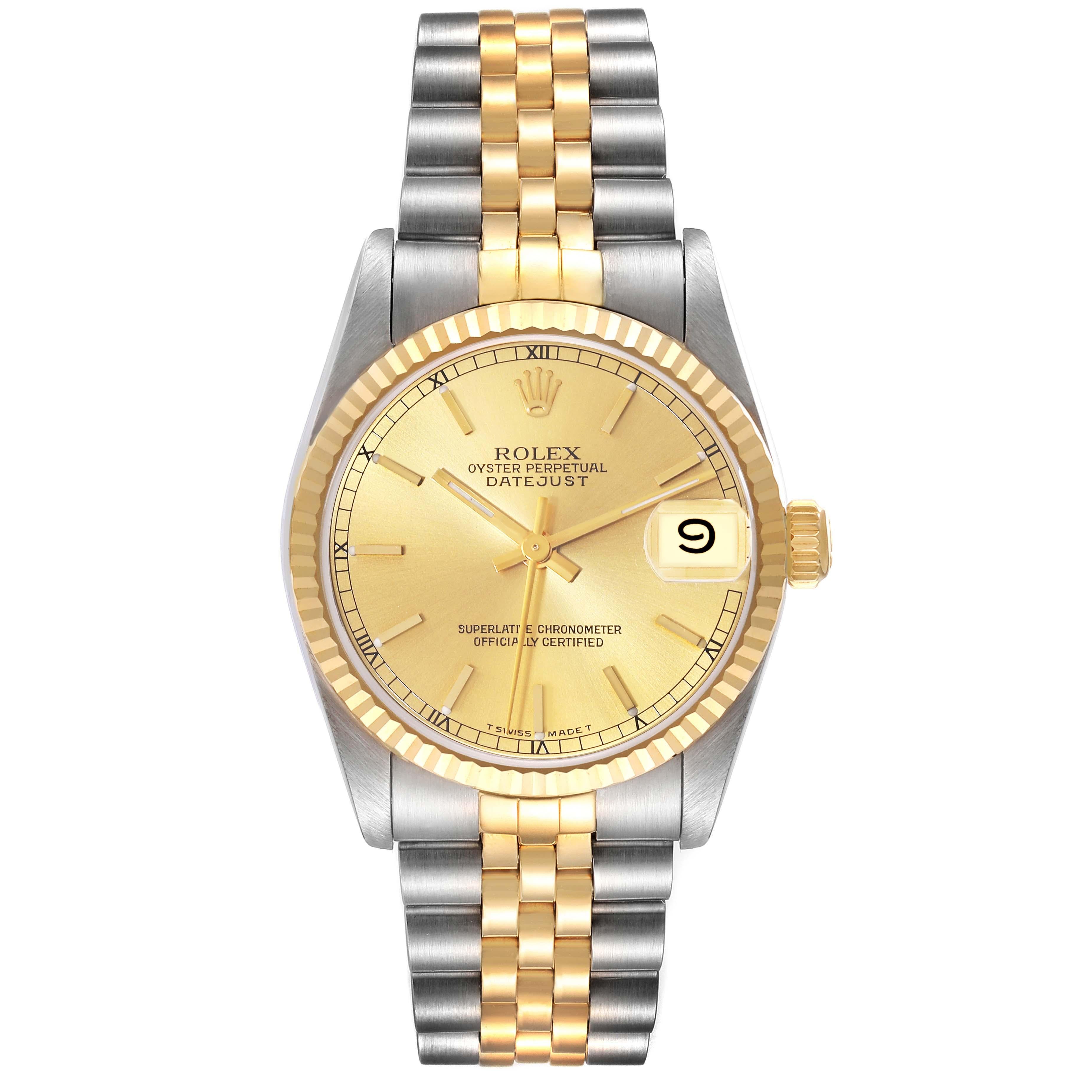 Rolex Datejust Midsize Champagne Dial Steel Yellow Gold Ladies Watch 68273. Officially certified chronometer automatic self-winding movement. Stainless steel oyster case 31 mm in diameter. Rolex logo on an 18K yellow gold crown. 18k yellow gold