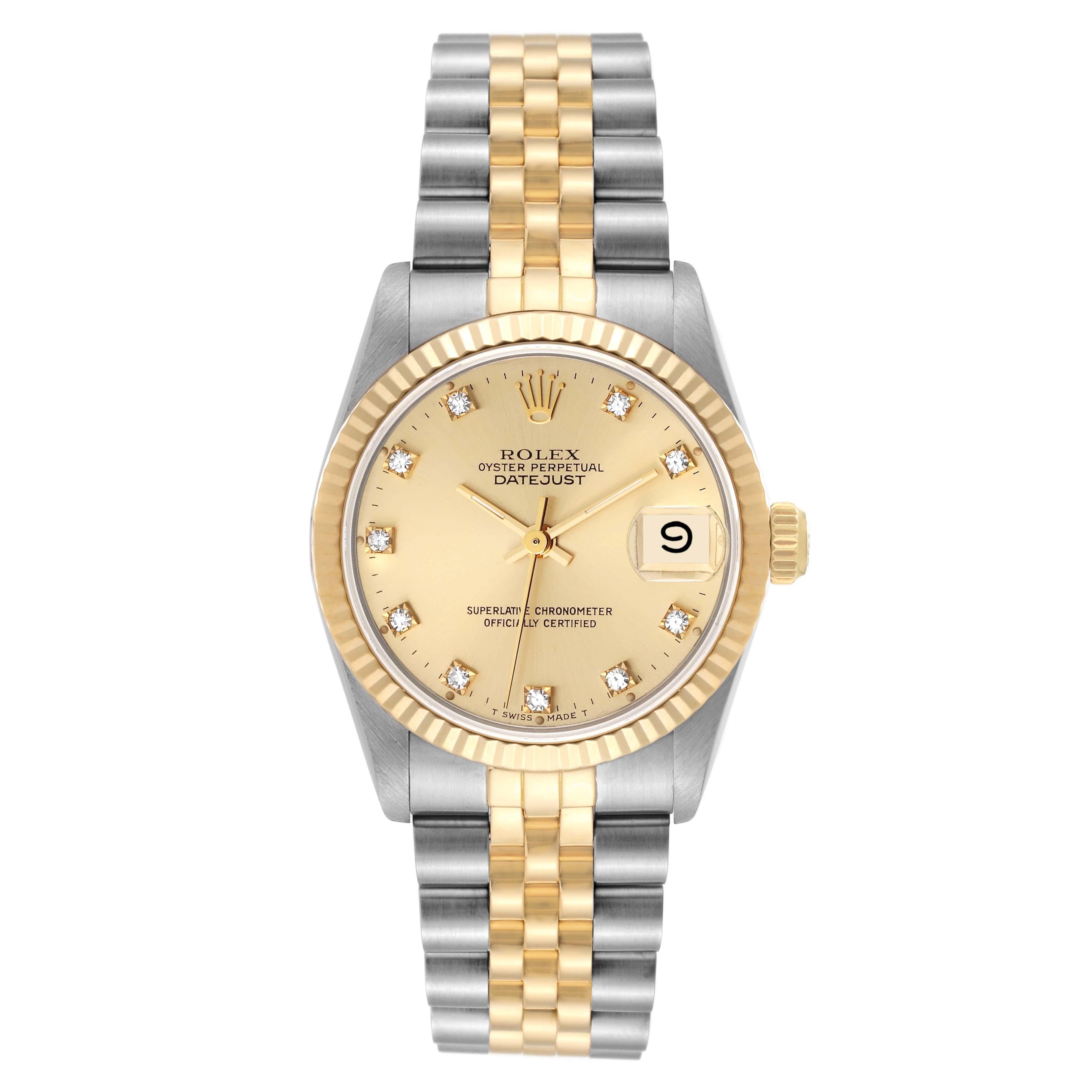 Rolex Datejust Midsize Diamond Dial Steel Yellow Gold Ladies Watch 68273. Officially certified chronometer automatic self-winding movement. Stainless steel oyster case 31 mm in diameter. Rolex logo on an 18K yellow gold crown. 18k yellow gold fluted