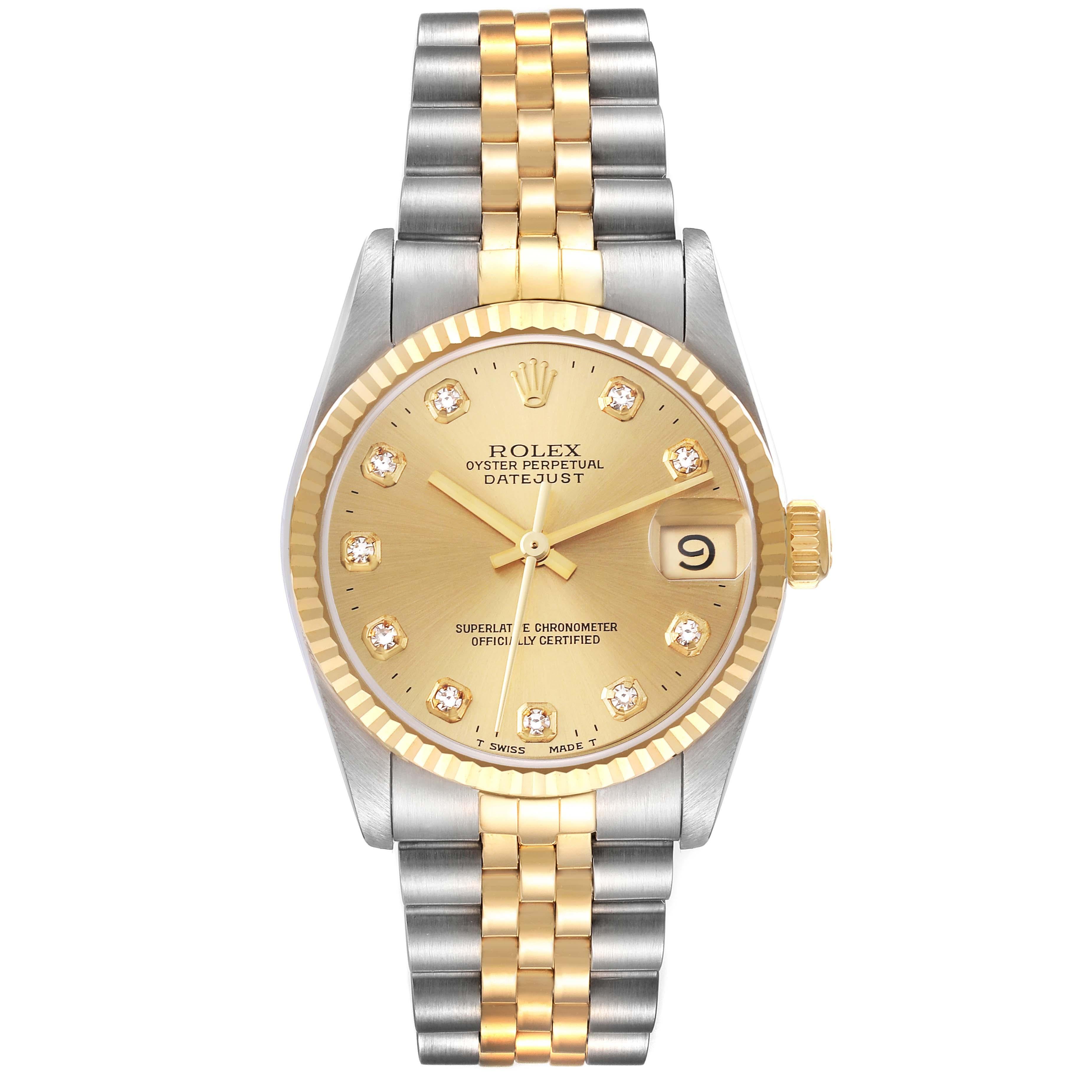 Rolex Datejust Midsize Diamond Dial Steel Yellow Gold Ladies Watch 68273. Officially certified chronometer automatic self-winding movement. Stainless steel oyster case 31 mm in diameter. Rolex logo on an 18k yellow gold crown. 18k yellow gold fluted