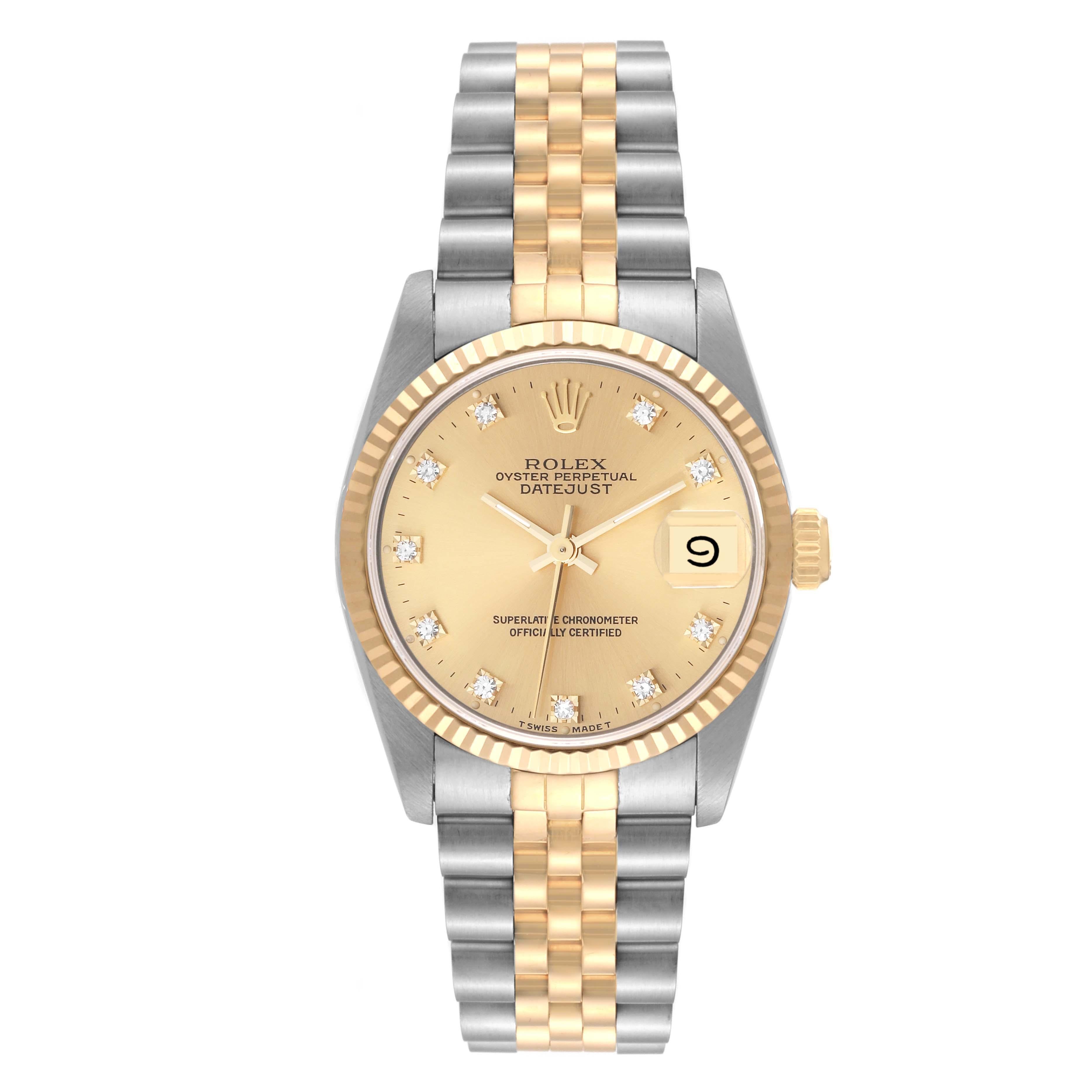 Rolex Datejust Midsize Diamond Dial Steel Yellow Gold Ladies Watch 68273. Officially certified chronometer automatic self-winding movement. Stainless steel oyster case 31 mm in diameter. Rolex logo on an 18k yellow gold crown. 18k yellow gold fluted