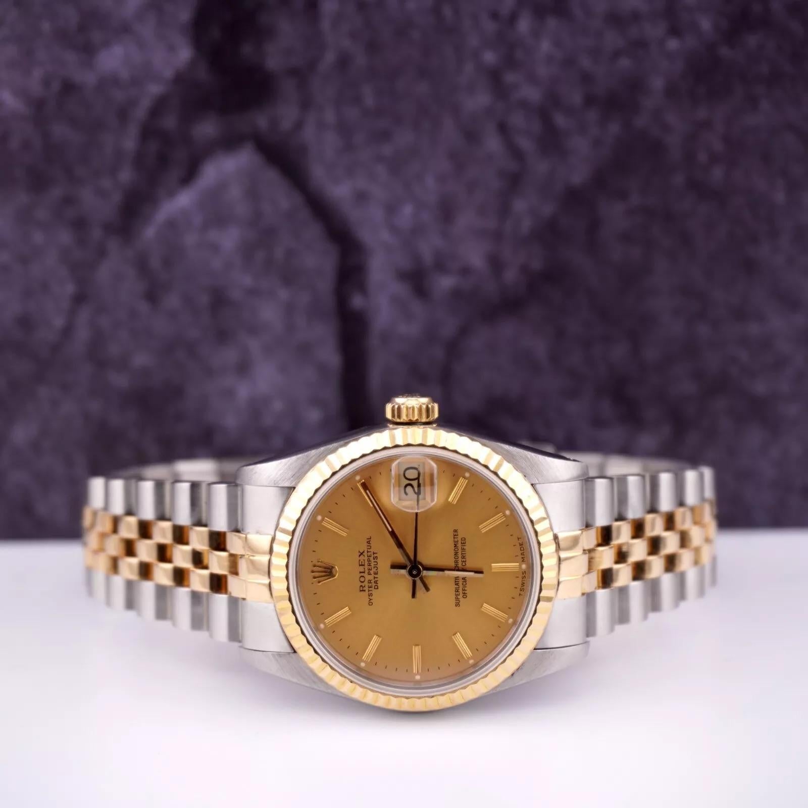 Rolex Datejust 31mm Watch

Pre-owned w/ Original Box & Card
100% Authentic Authenticity Card
Condition - (Great Condition) - See Pics
Watch Reference - 68273
Model - Datejust
Dial Color - Gold
Material - 18k Yellow Gold/Stainless Steel
Watch Will
