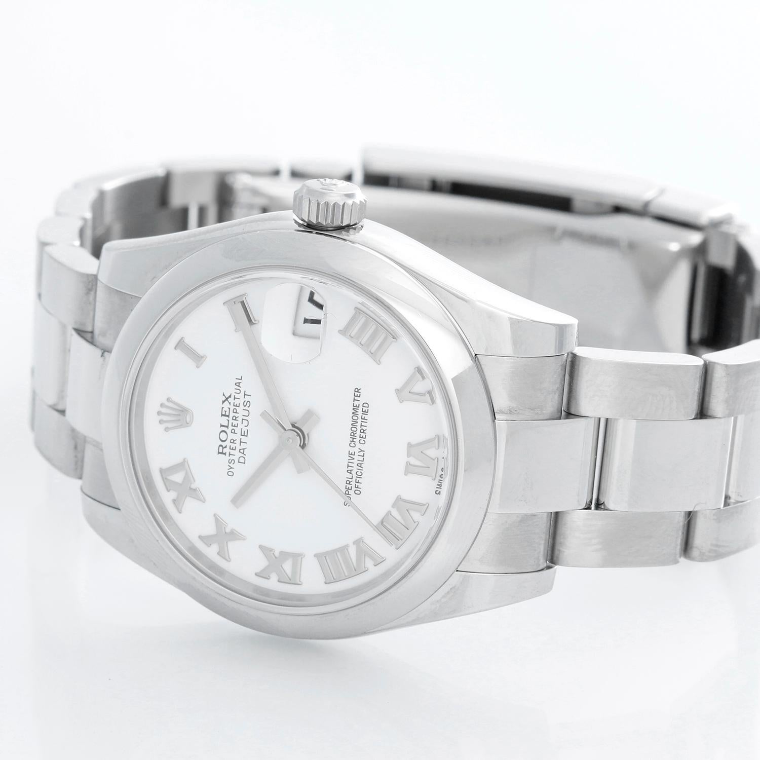Rolex Datejust Midsize Men's or Ladies Steel Watch 178240 - Automatic winding, 31 jewels, Quickset date, sapphire crystal. Stainless steel case with smooth bezel ( 31 mm ). White dial with Roman numerals. Stainless steel oyster bracelet. Pre-owned