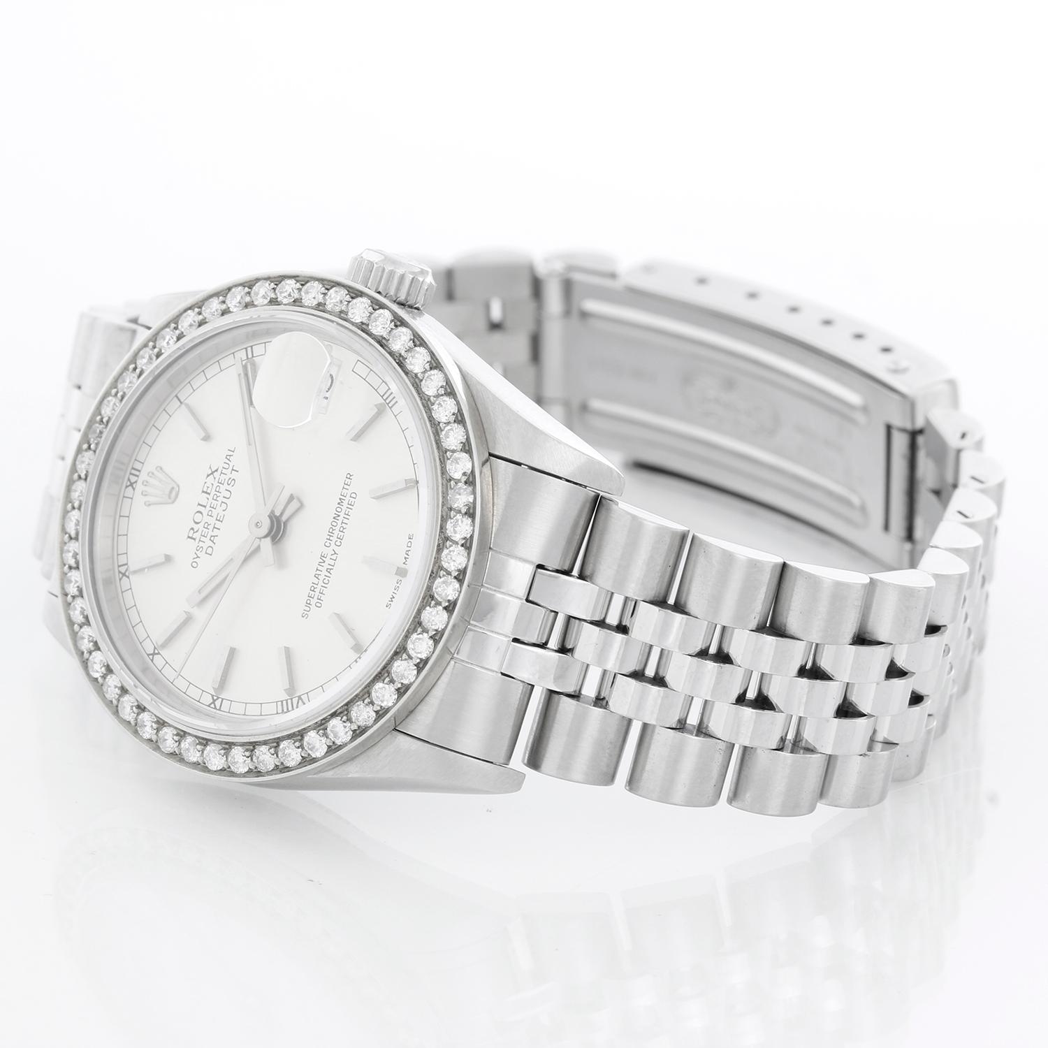 Rolex Datejust Midsize Men's or Ladies Steel Watch 68240 - Automatic winding, 29 jewels, Quickset date, sapphire crystal. Stainless steel case with custom diamond bezel (31mm diameter). Silver dial with stick hour markers. Stainless steel jubilee