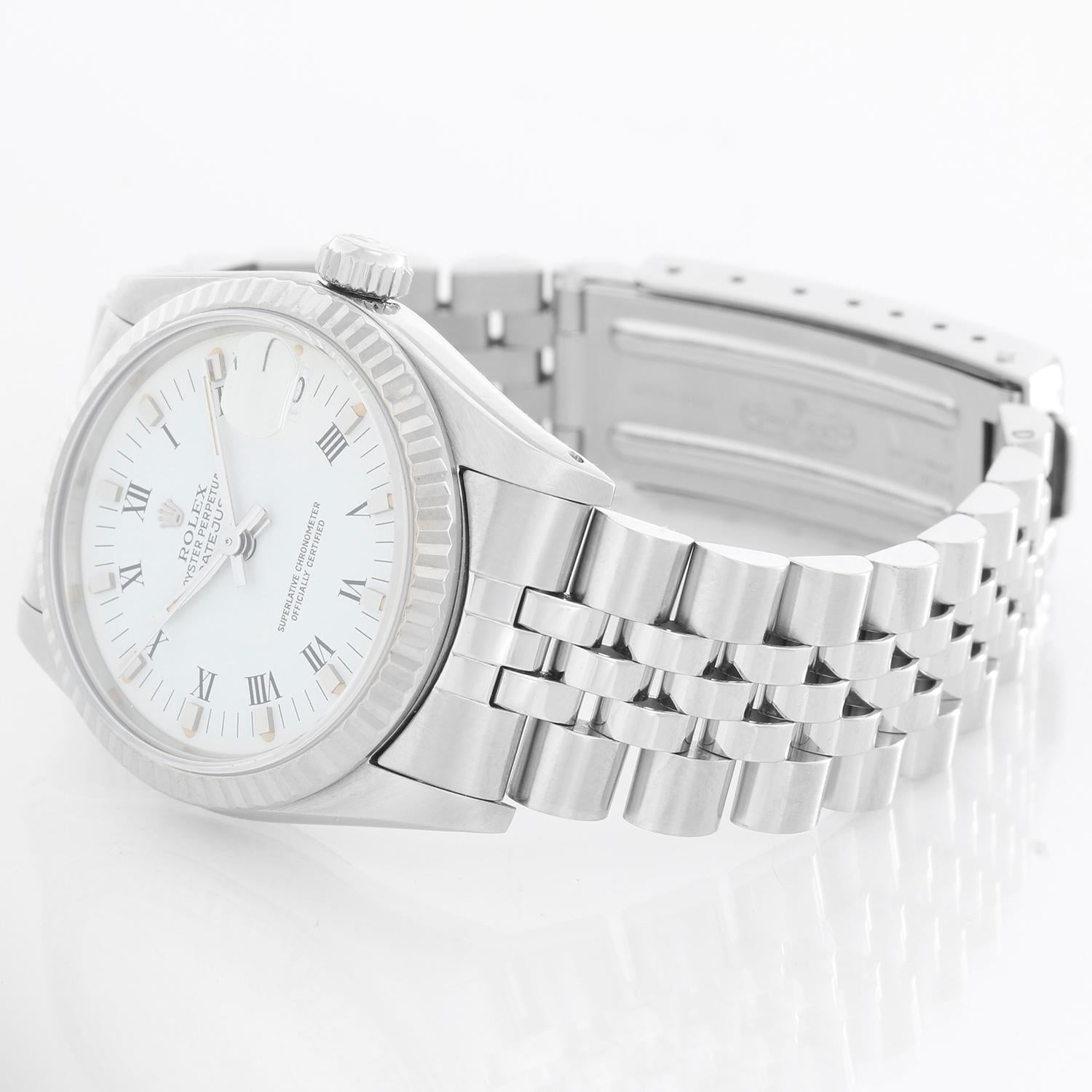 Rolex Datejust Midsize Men's or Ladies Steel Watch 68274 - Automatic winding, 29 jewels, Quickset date, sapphire crystal. Stainless steel case (31 mm ). White dial with roman numerals and. Stainless steel Jubilee Bracelet. Pre-owned with custom box