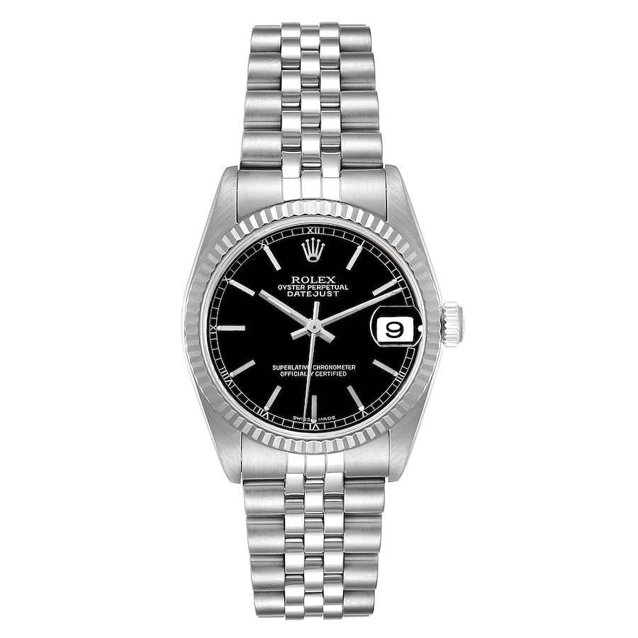 Rolex Datejust Midsize Steel White Gold Black Dial Ladies Watch 78274. Mouvement à remontage automatique certifié officiellement chronomètre. Boîtier oyster en acier inoxydable de 31 mm de diamètre. Logo Rolex sur une couronne. Lunette cannelée en