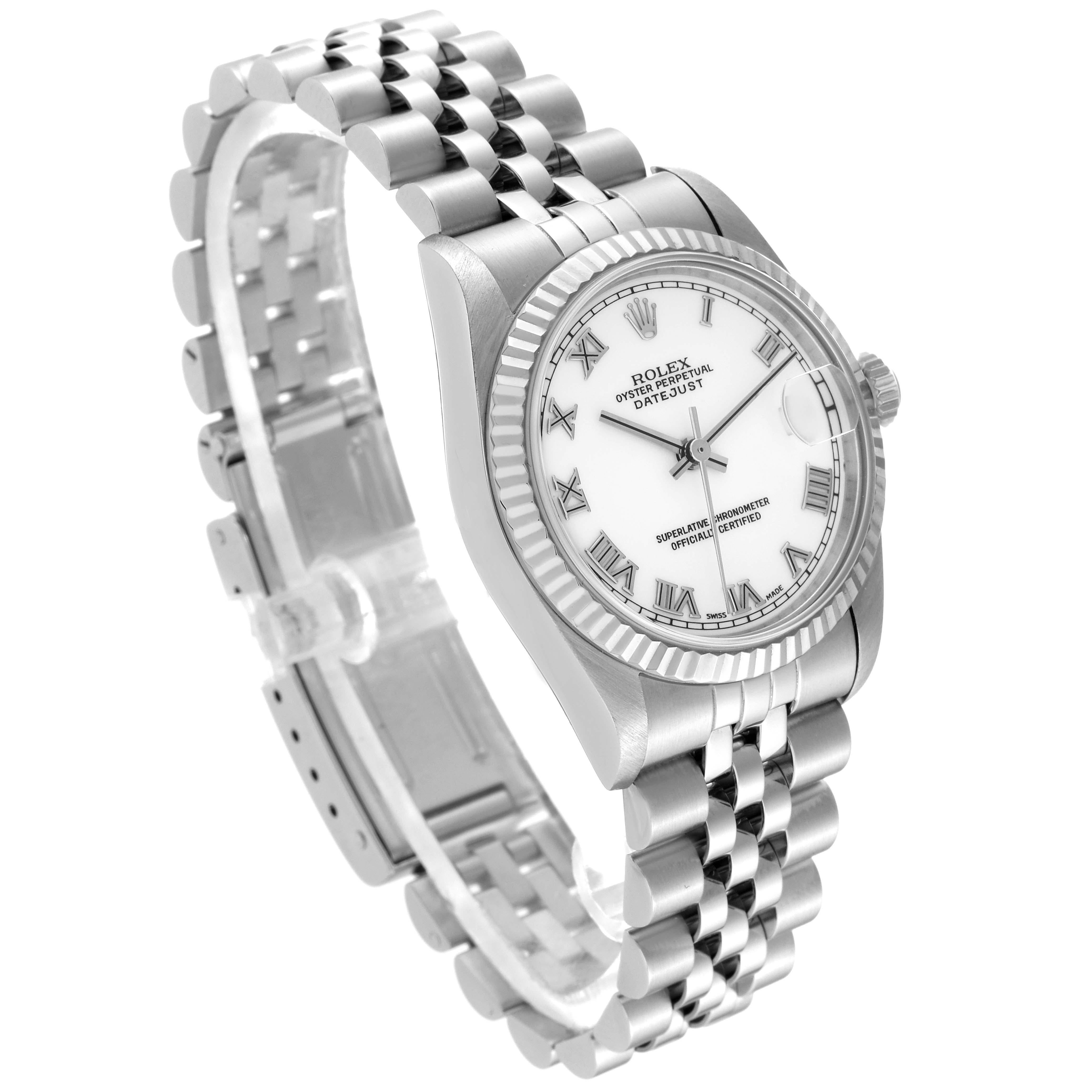 Rolex Datejust Midsize Steel White Gold Ladies Watch 68274. Officially certified chronometer automatic self-winding movement. Stainless steel oyster case 31.0 mm in diameter. Rolex logo on the crown. 18k white gold fluted bezel. Scratch resistant