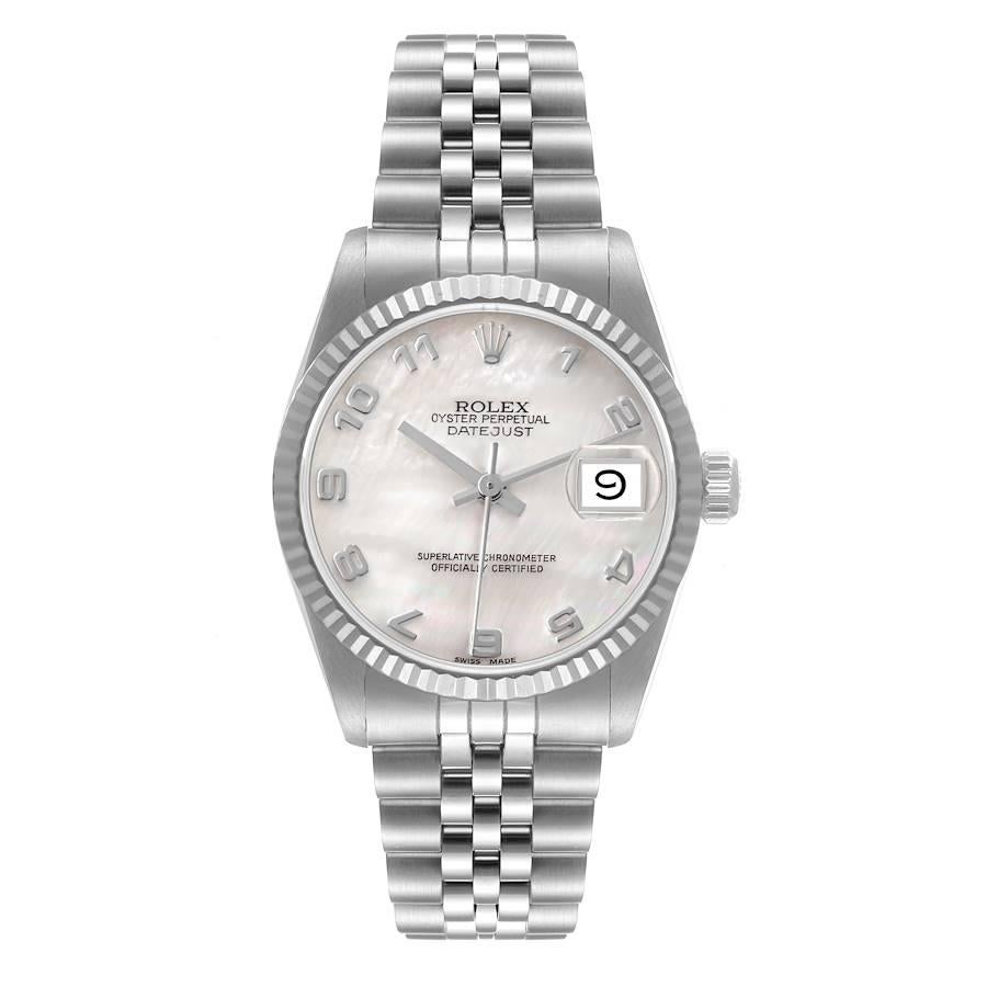 Rolex Datejust Midsize Steel White Gold Mother of Pearl Dial Ladies Watch 68274. Officially certified chronometer self-winding movement. Stainless steel oyster case 31.0 mm in diameter. Rolex logo on a crown. 18k white gold fluted bezel. Scratch