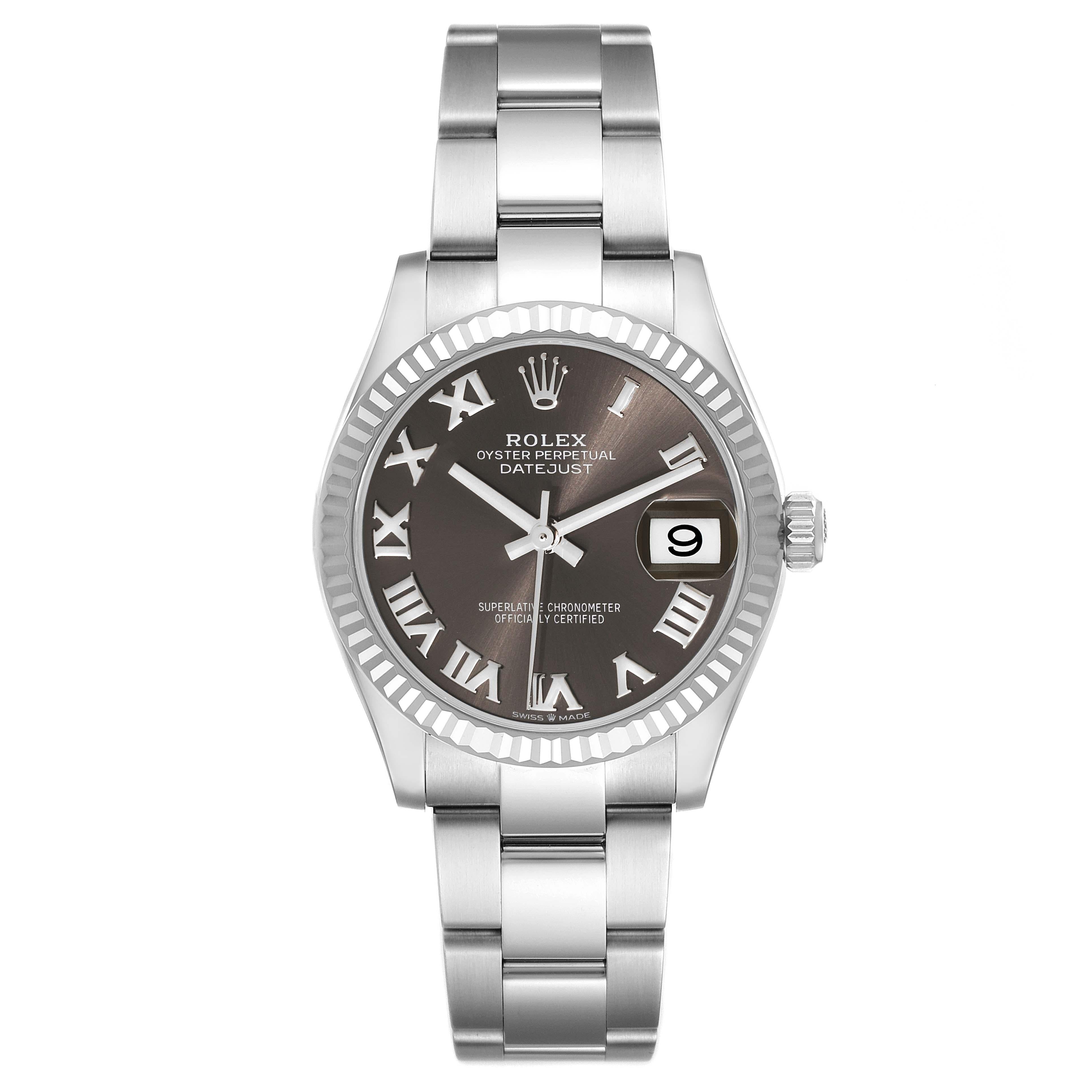 Rolex Datejust Midsize Steel White Gold Slate Dial Ladies Watch 278274. Officially certified chronometer self-winding movement. Stainless steel oyster case 31.0 mm in diameter. Rolex logo on a crown. 18k white gold fluted bezel. Scratch resistant
