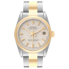 Rolex Datejust Damenuhr aus Stahl und Gelbgold mit Jahrestag-Zifferblatt 68243