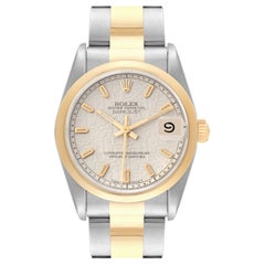 Rolex Montre Datejust de taille moyenne en acier avec cadran anniversaire en or jaune pour femmes 68243