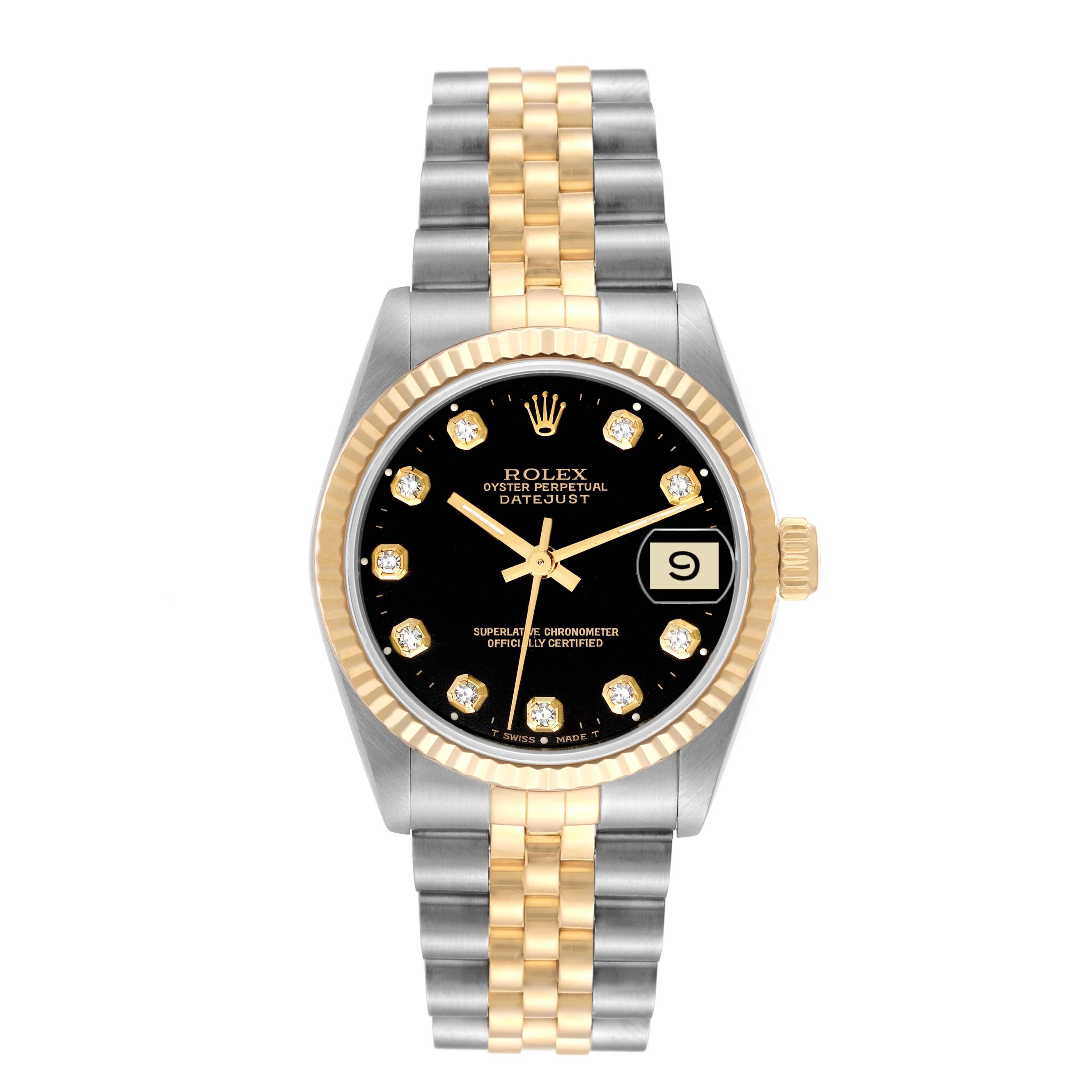Rolex Datejust Midsize Steel Yellow Gold Black Diamond Ladies Watch 68273. Officially certified chronometer automatic self-winding movement. Stainless steel oyster case 31 mm in diameter. Rolex logo on an 18K yellow gold crown. 18k yellow gold