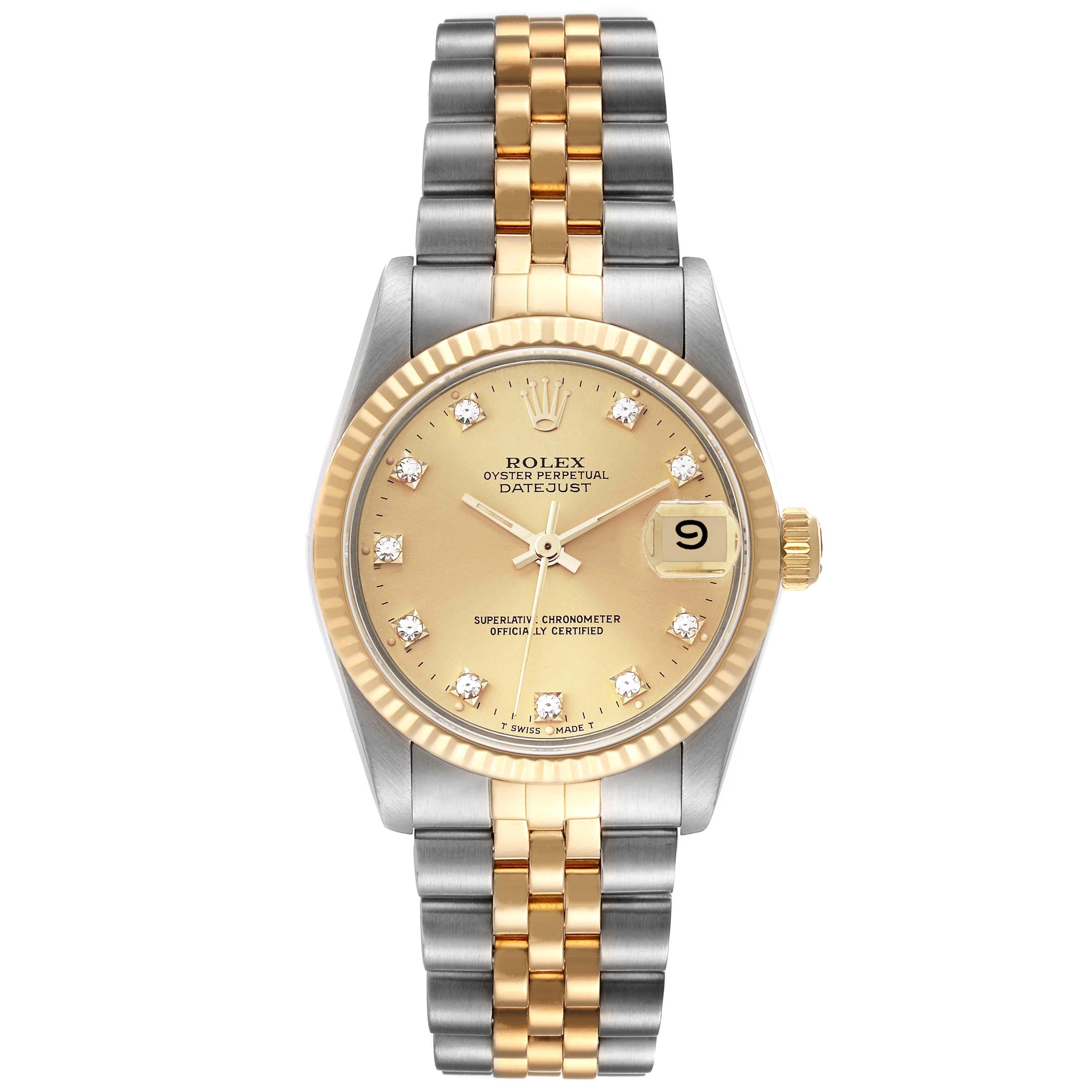 Rolex Datejust Midsize Steel Yellow Gold Diamond Dial Ladies Watch 68273. Officially certified chronometer automatic self-winding movement. Stainless steel oyster case 31 mm in diameter. Rolex logo on an 18K yellow gold crown. 18k yellow gold fluted