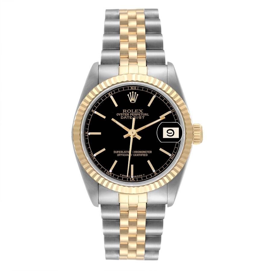 Rolex Datejust Midsize Steel Yellow Gold Ladies Watch 68273 Box Papers. Officially certified chronometer automatic self-winding movement. Stainless steel oyster case 31 mm in diameter. Rolex logo on an 18K yellow gold crown. 18k yellow gold fluted