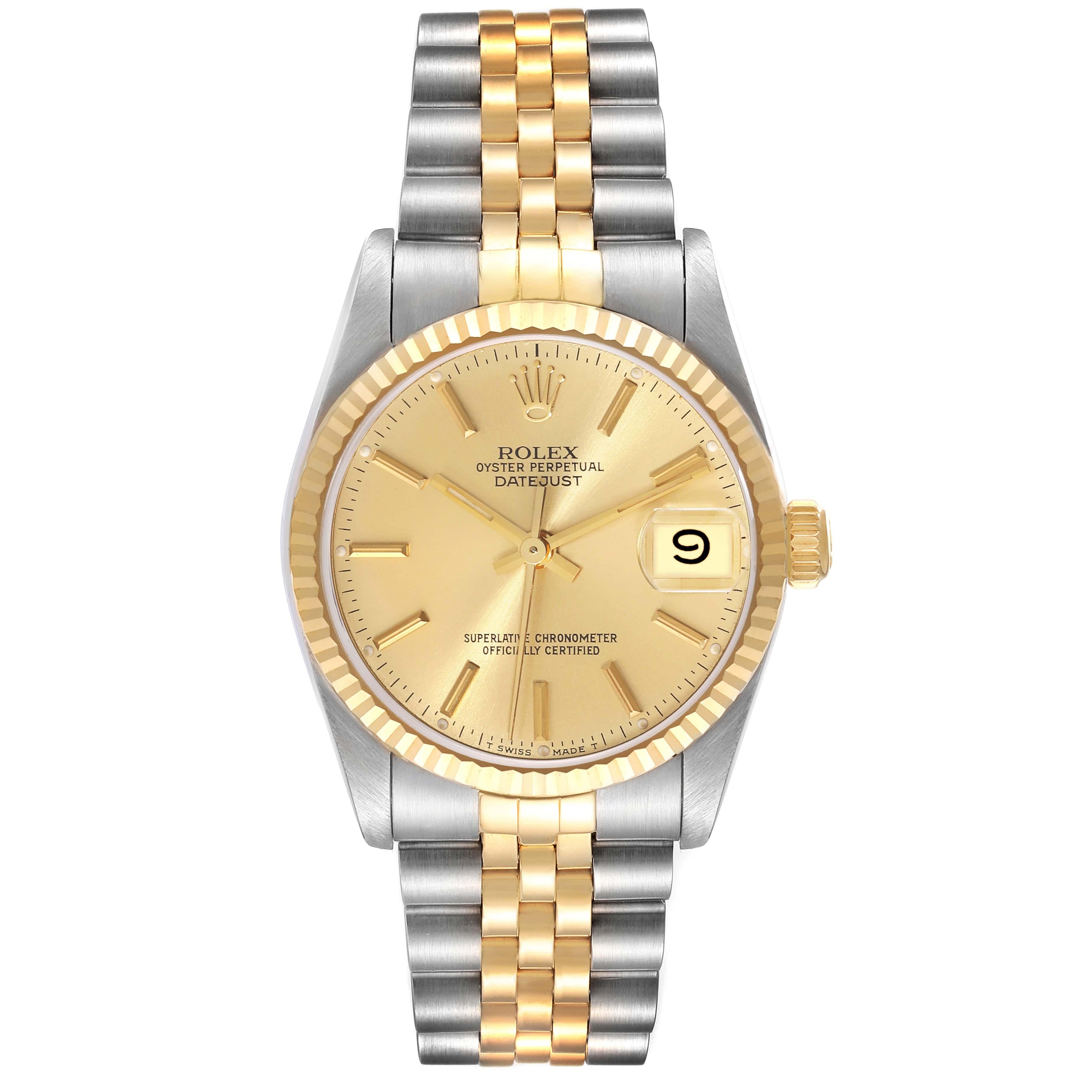 Rolex Datejust Midsize Steel Yellow Gold Ladies Watch 68273 Box Papers. Officially certified chronometer automatic self-winding movement. Stainless steel oyster case 31 mm in diameter. Rolex logo on an 18K yellow gold crown. 18k yellow gold fluted