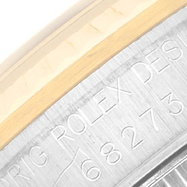 Rolex Datejust Midsize Stahl Gelbgold Damenuhr 68273 Box Papiere. Offiziell zertifiziertes Chronometerwerk mit automatischem Aufzug. Austerngehäuse aus Edelstahl mit einem Durchmesser von 31 mm. Rolex-Logo auf einer Krone aus 18 Karat Gelbgold. 18k