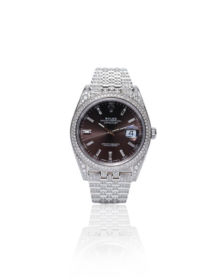 This Elita Diamond Set Rolex Datejust 126300 is an automatic Oyster perpetual watch with a 41 mm diameter and is crafted from Oystersteel, it is a fusion of both superior watch-making and the master craftsmanship of our expert gem setters. This